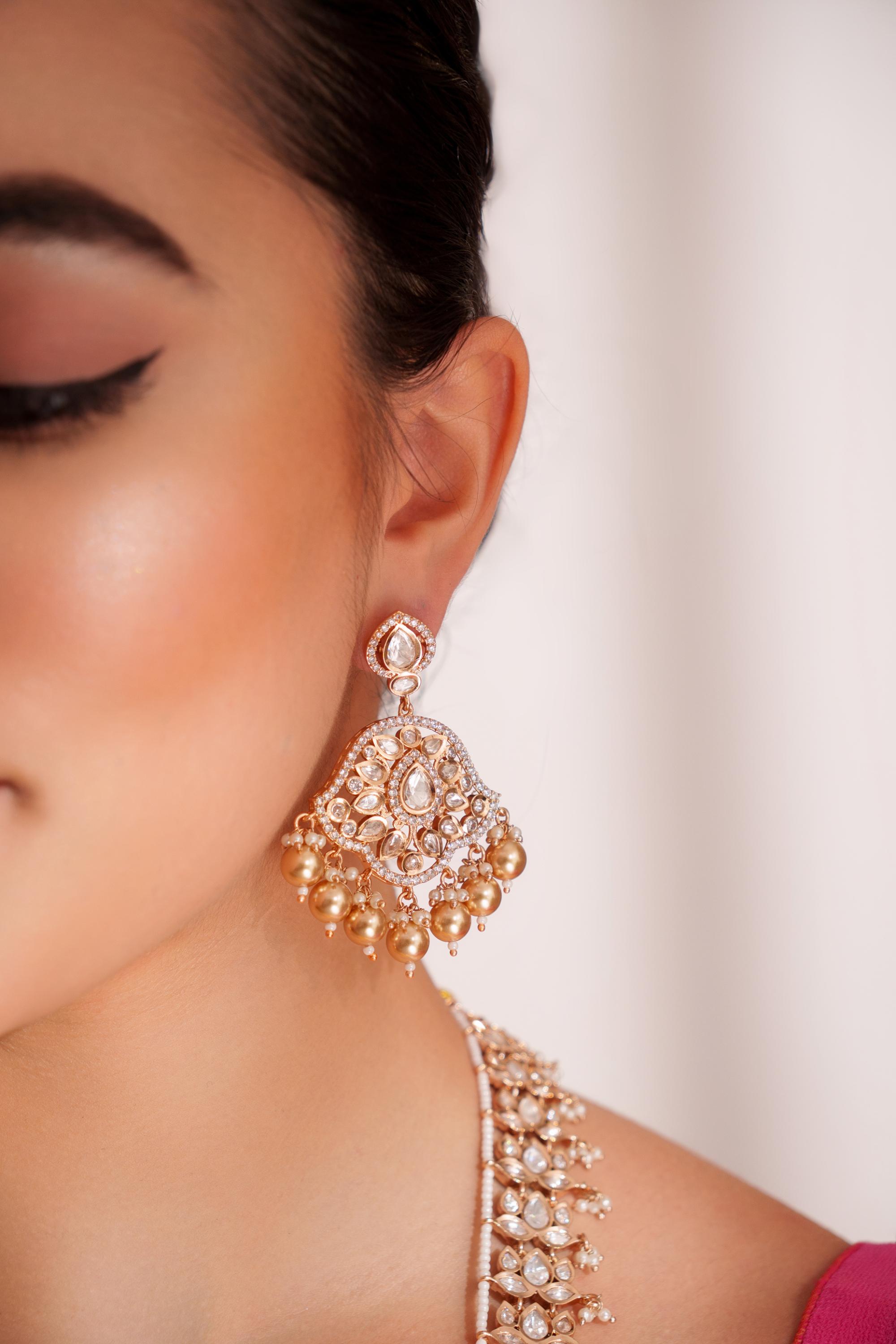 Bold and dramatic kundan long pendant necklace with elegant earrings