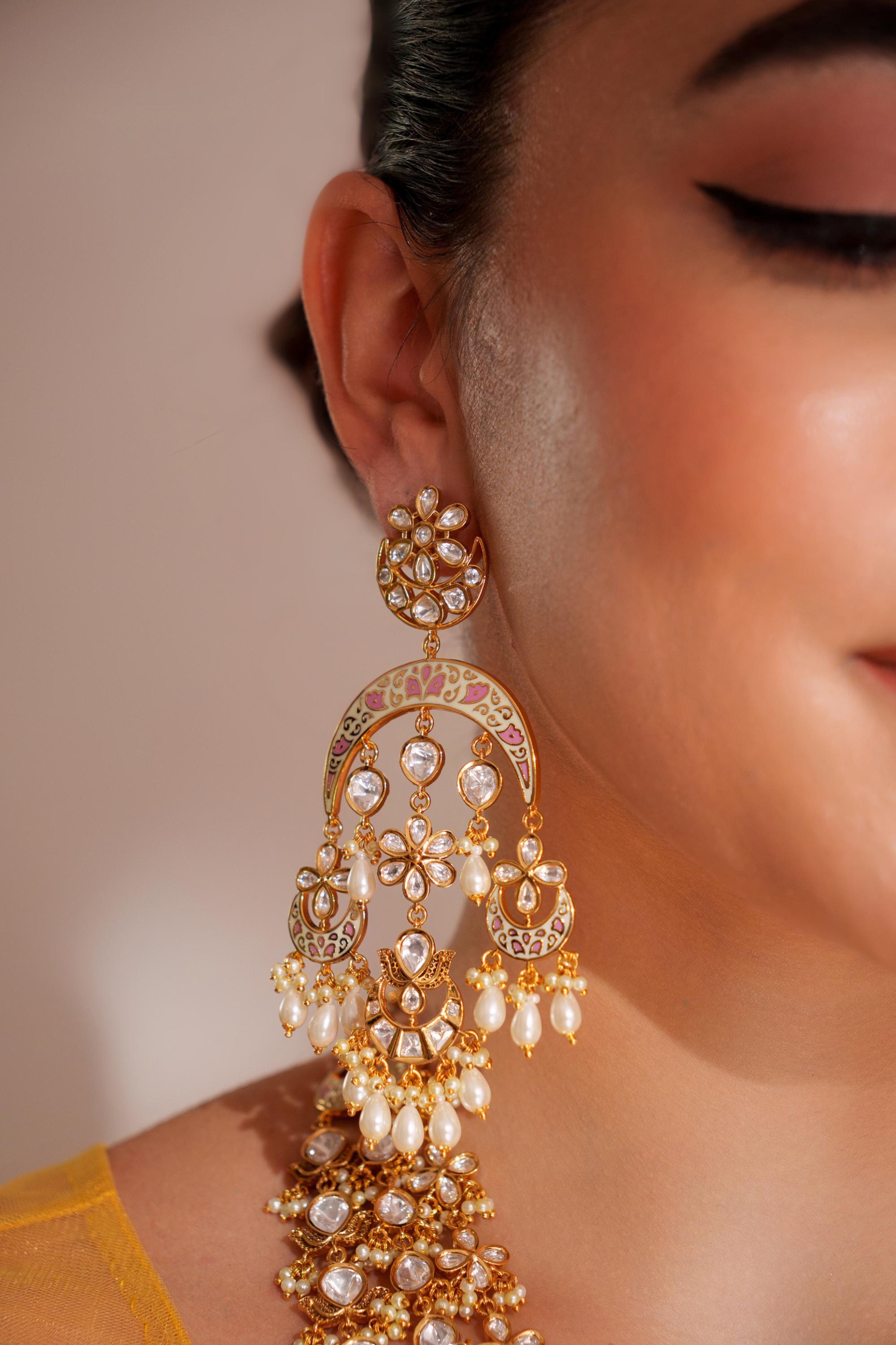 Bold and dramatic kundan long pendant necklace with elegant earrings
