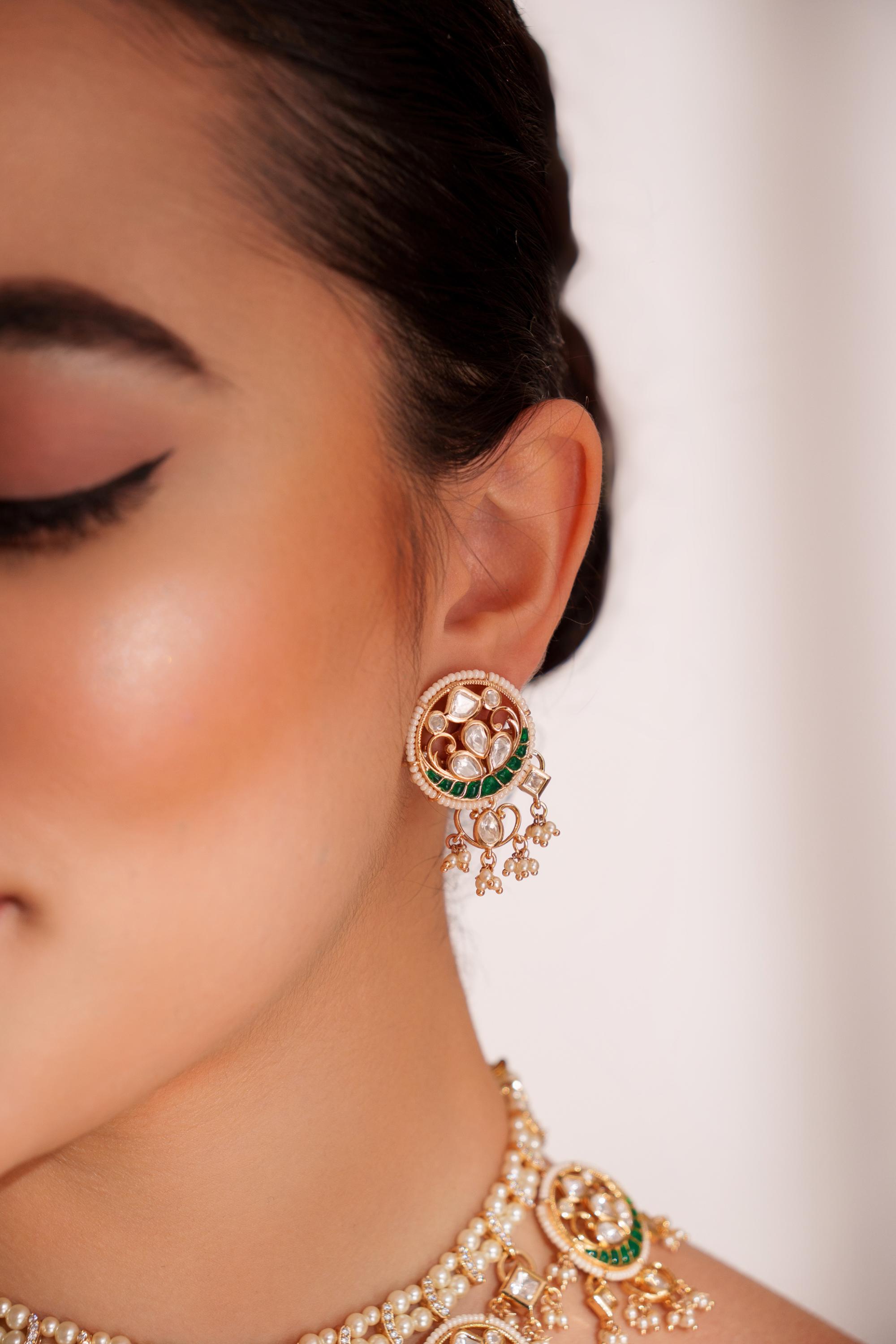 Elegant and stylish gold finish kundan polki necklace set