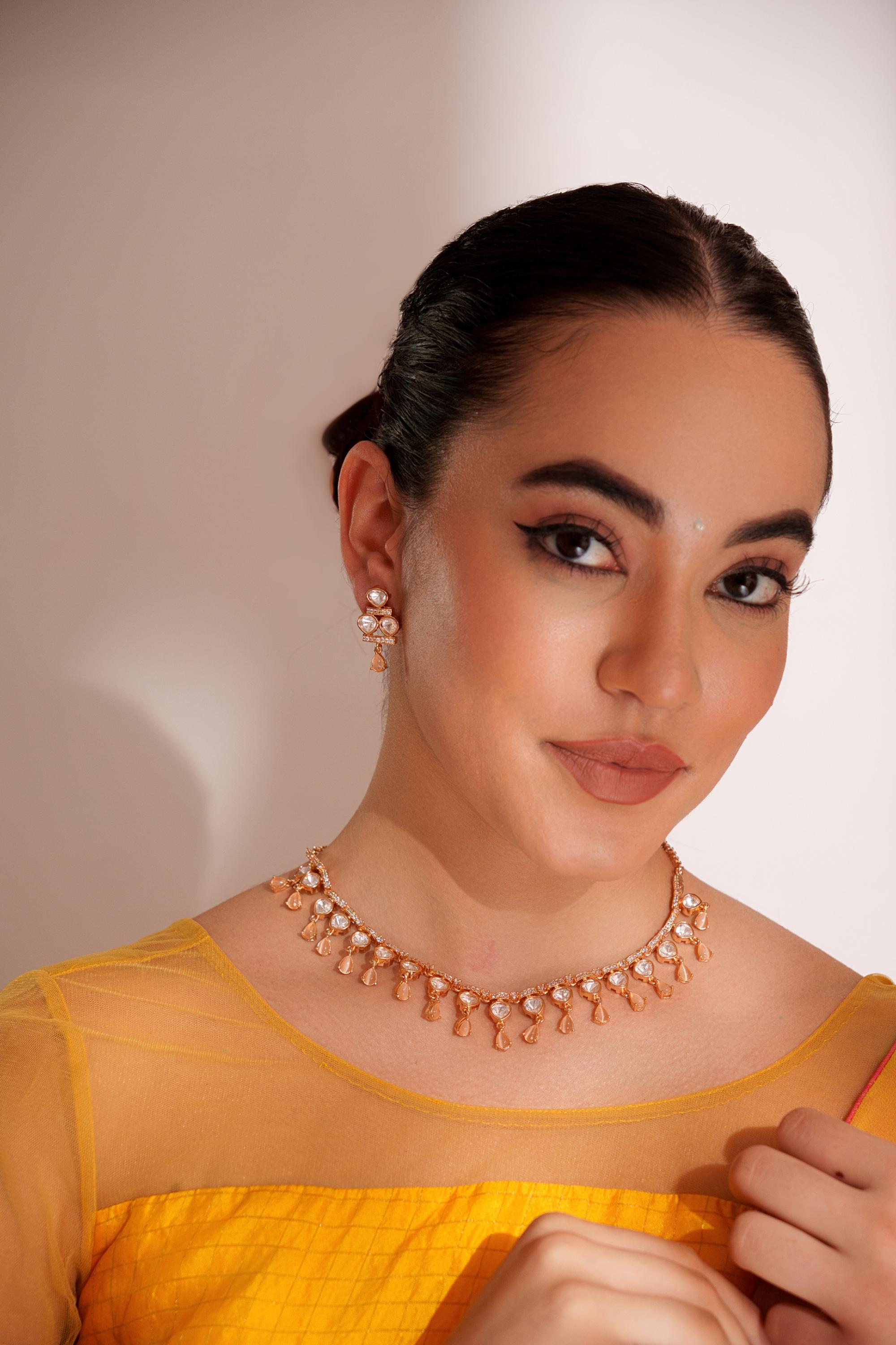Dramatic and stylish kundan necklace set with matching earrings