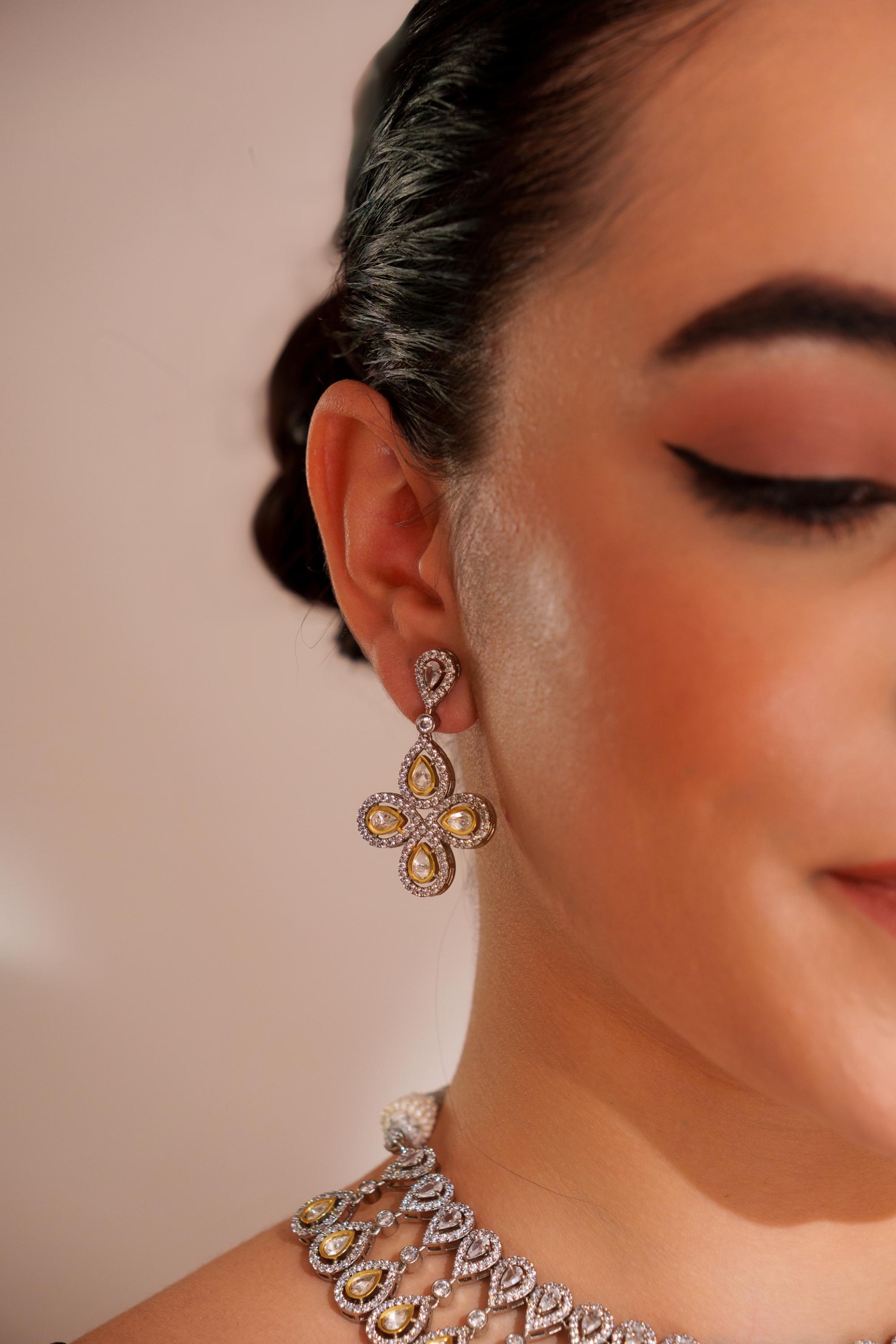Dramatic and stylish zircon stone necklace set with matching earrings