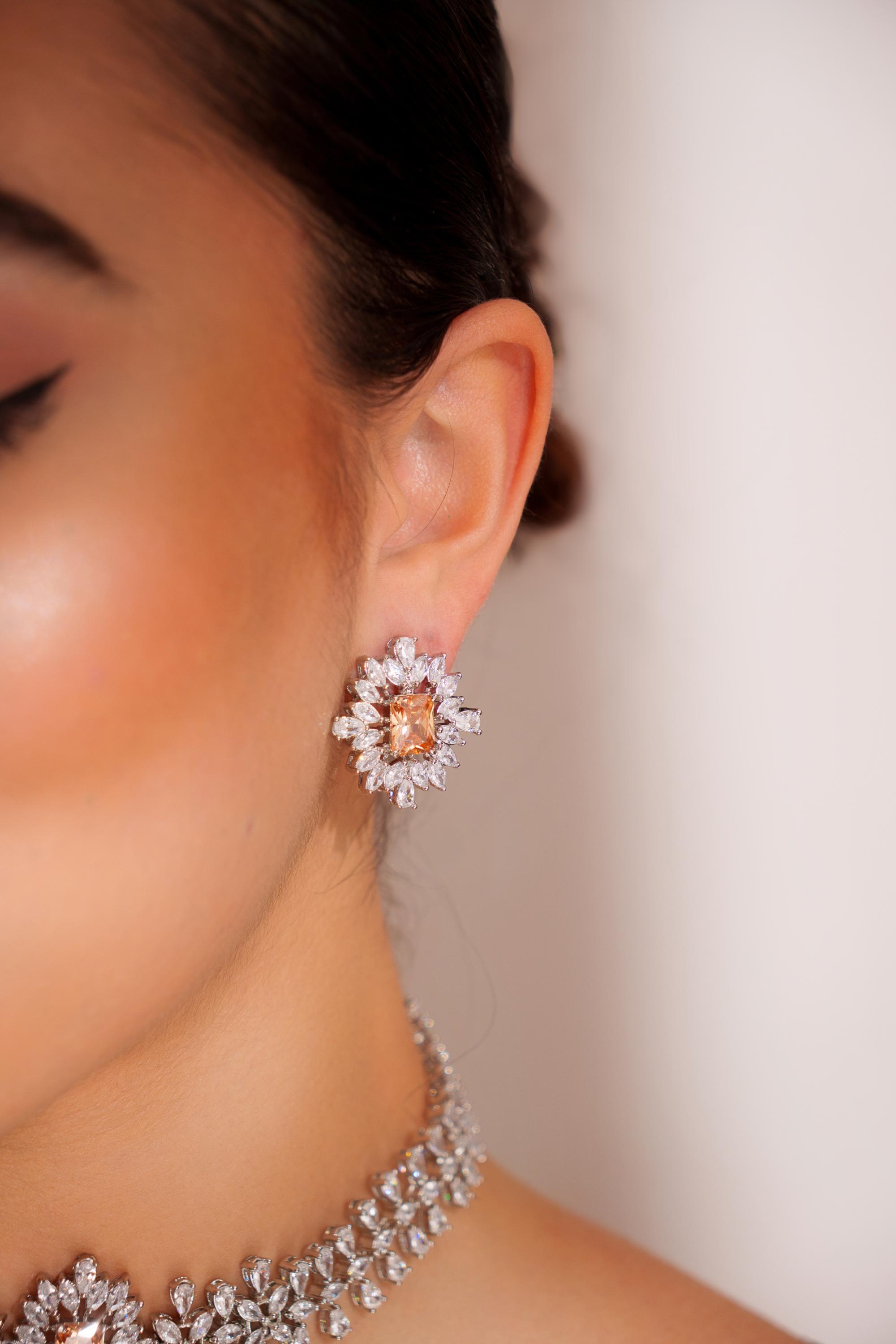 Elegant diamond choker with peach stone and earrings