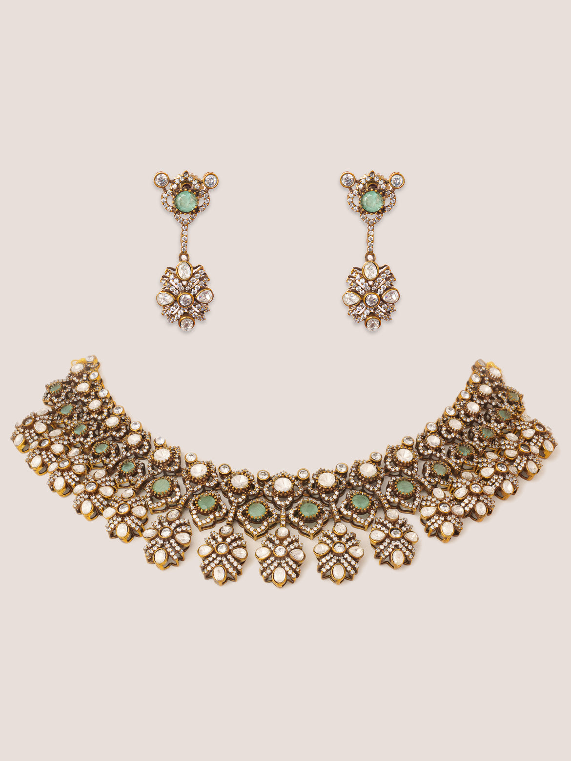 Dramatic and classy two tone kundan polki stone necklace set with matching earrings