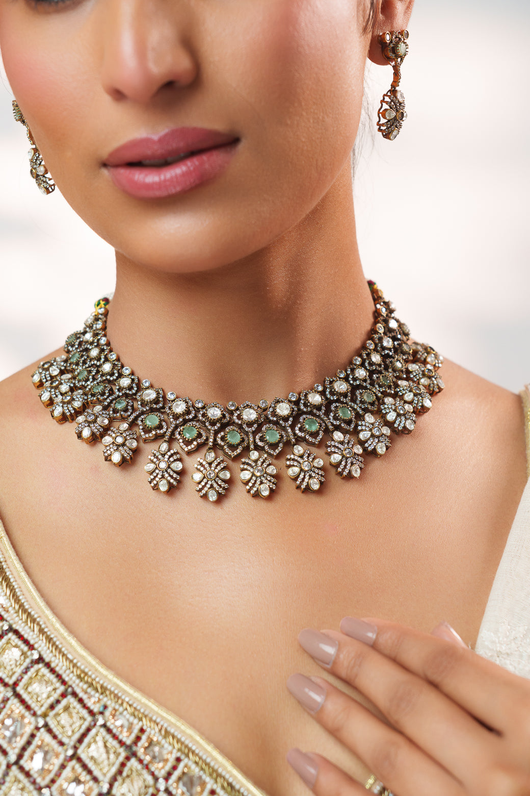 Dramatic and classy two tone kundan polki stone necklace set with matching earrings