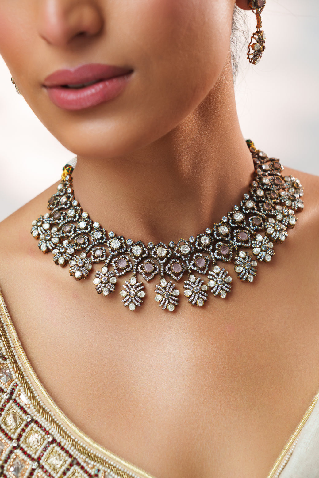 Dramatic and classy two tone kundan polki stone necklace set with matching earrings