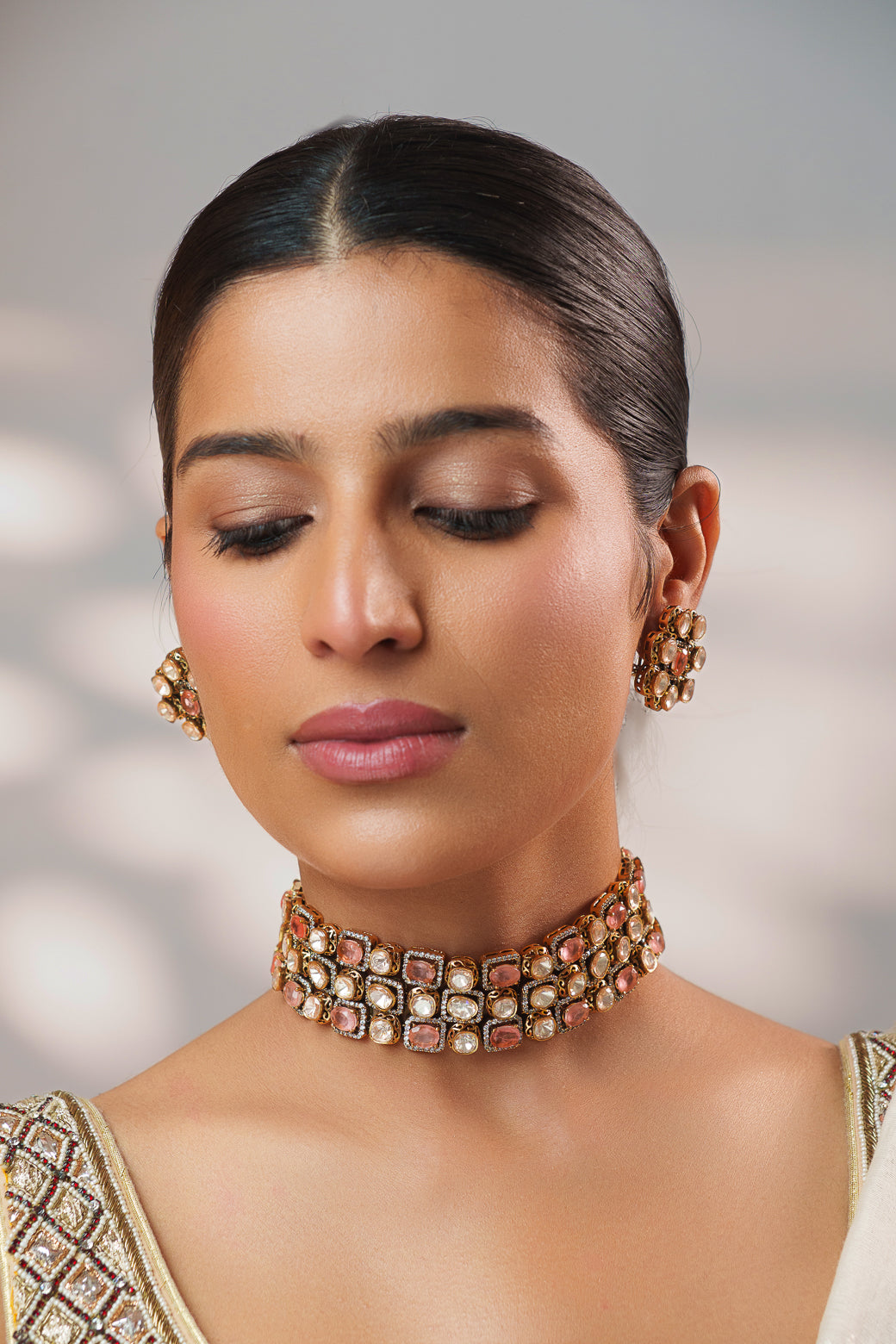Dramatic and classy two tone kundan choker with matching earrings