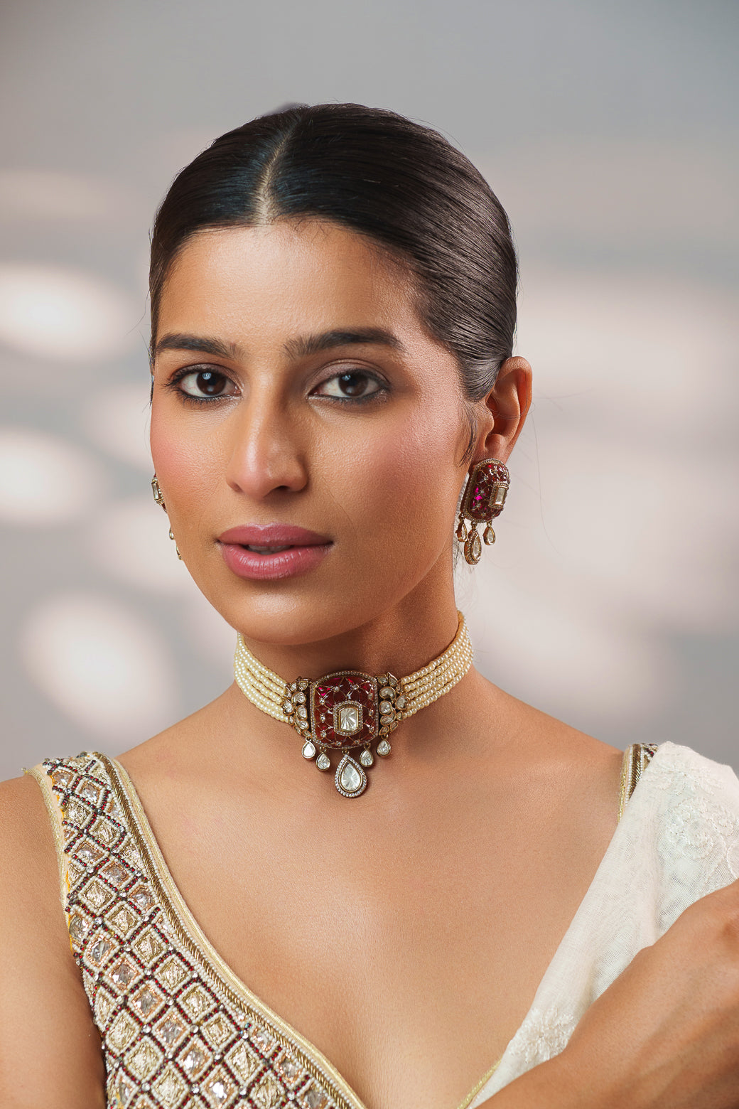 Dramatic and classy two tone polki choker with matching earrings