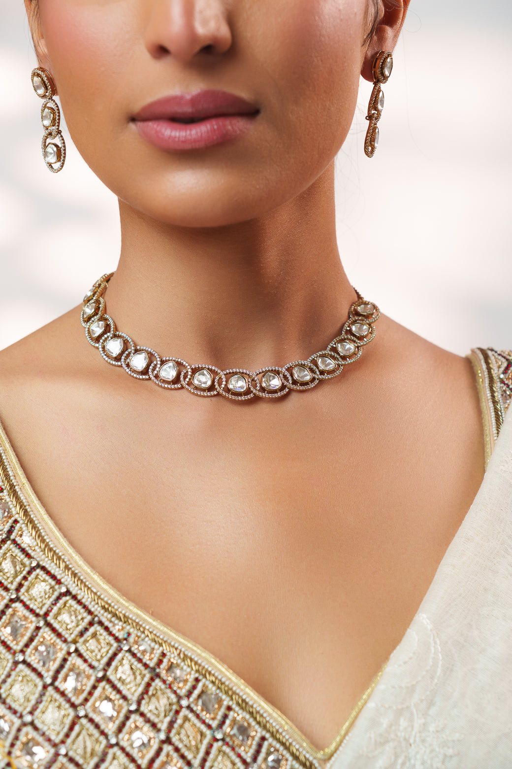 Dramatic and classy two tone kundan polki stone necklace set with matching earrings