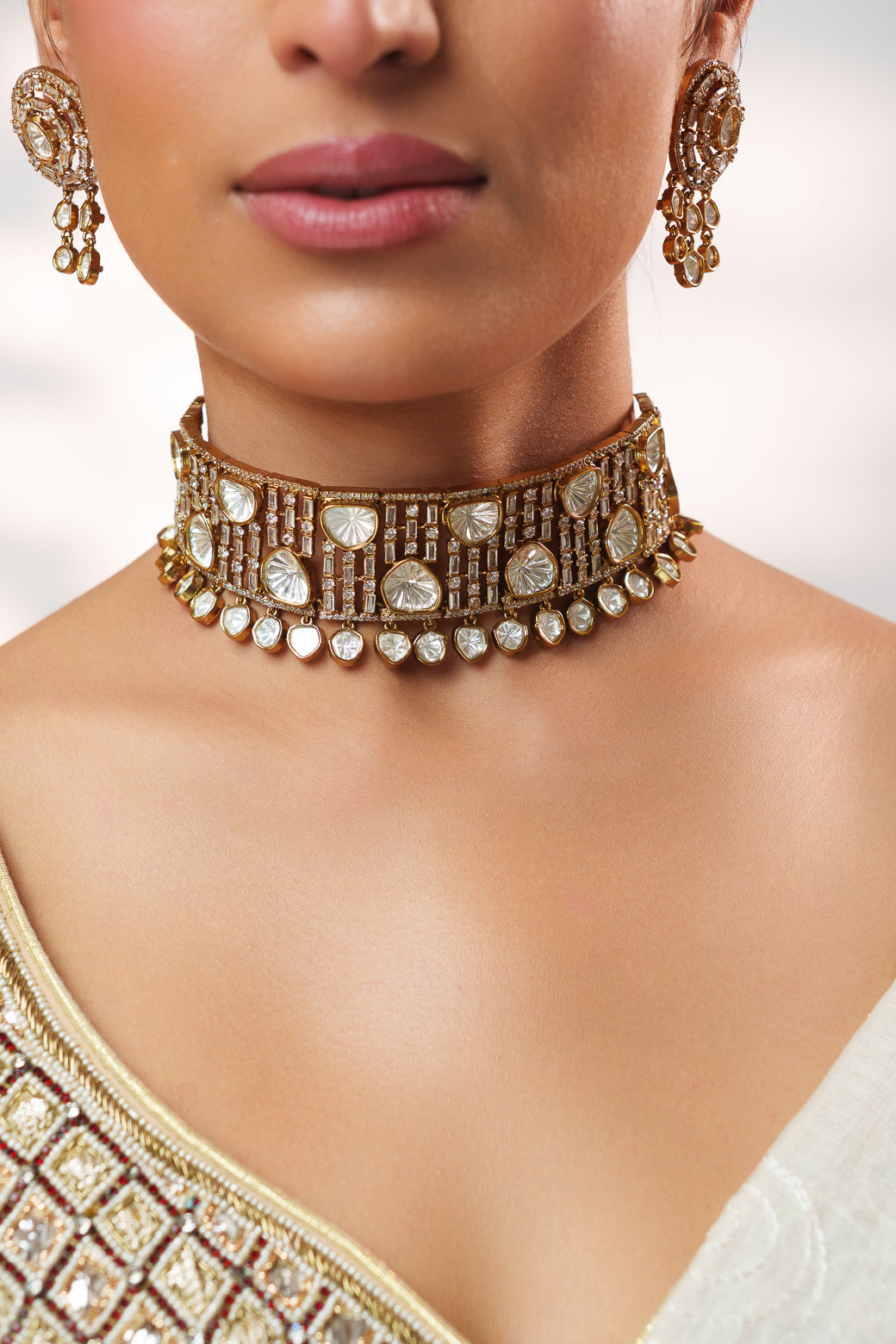 Dramatic and classy two tone polki choker with matching earrings