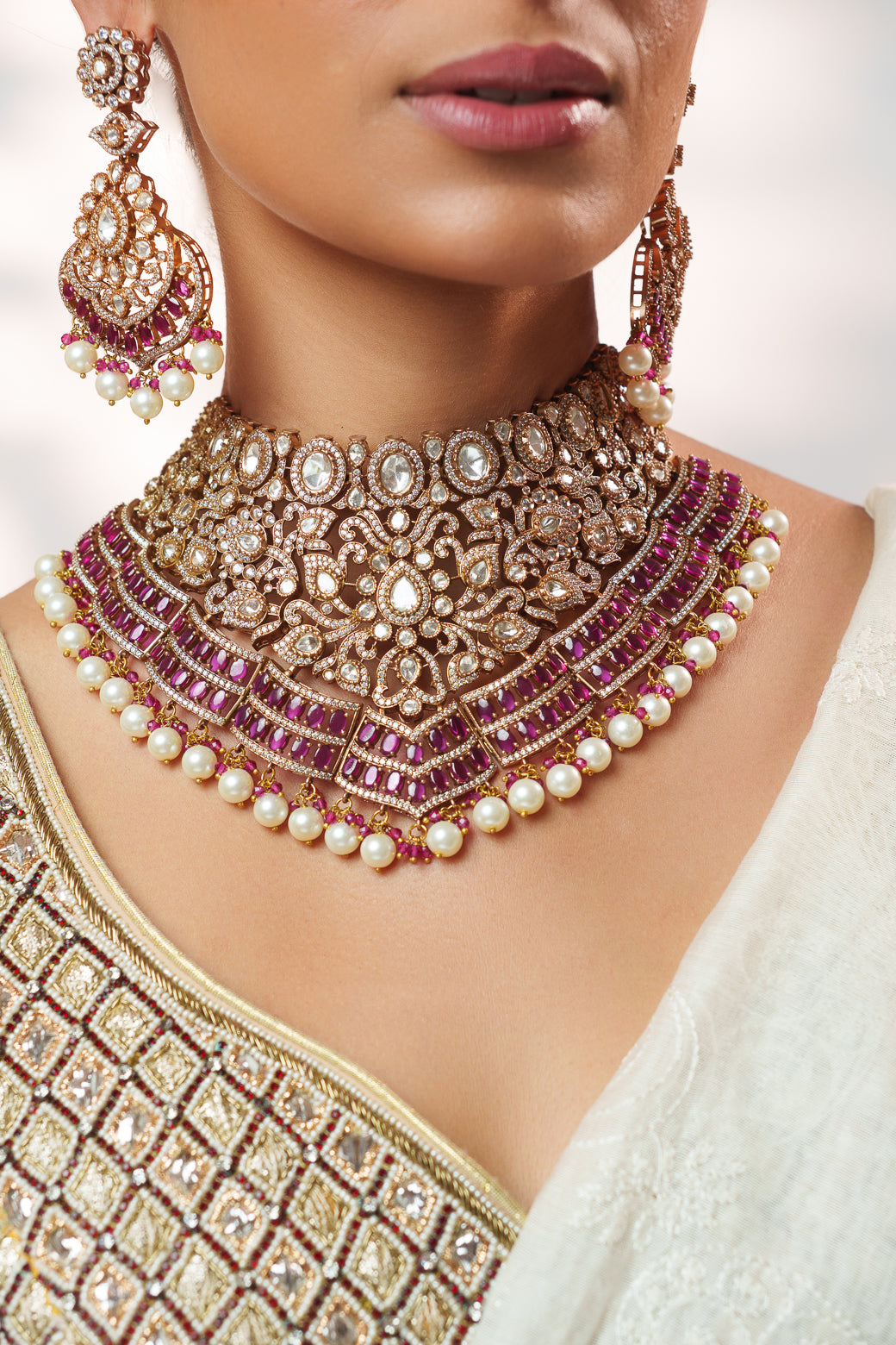 Bold and dramatic polki necklace set with matching earrings and maangtika