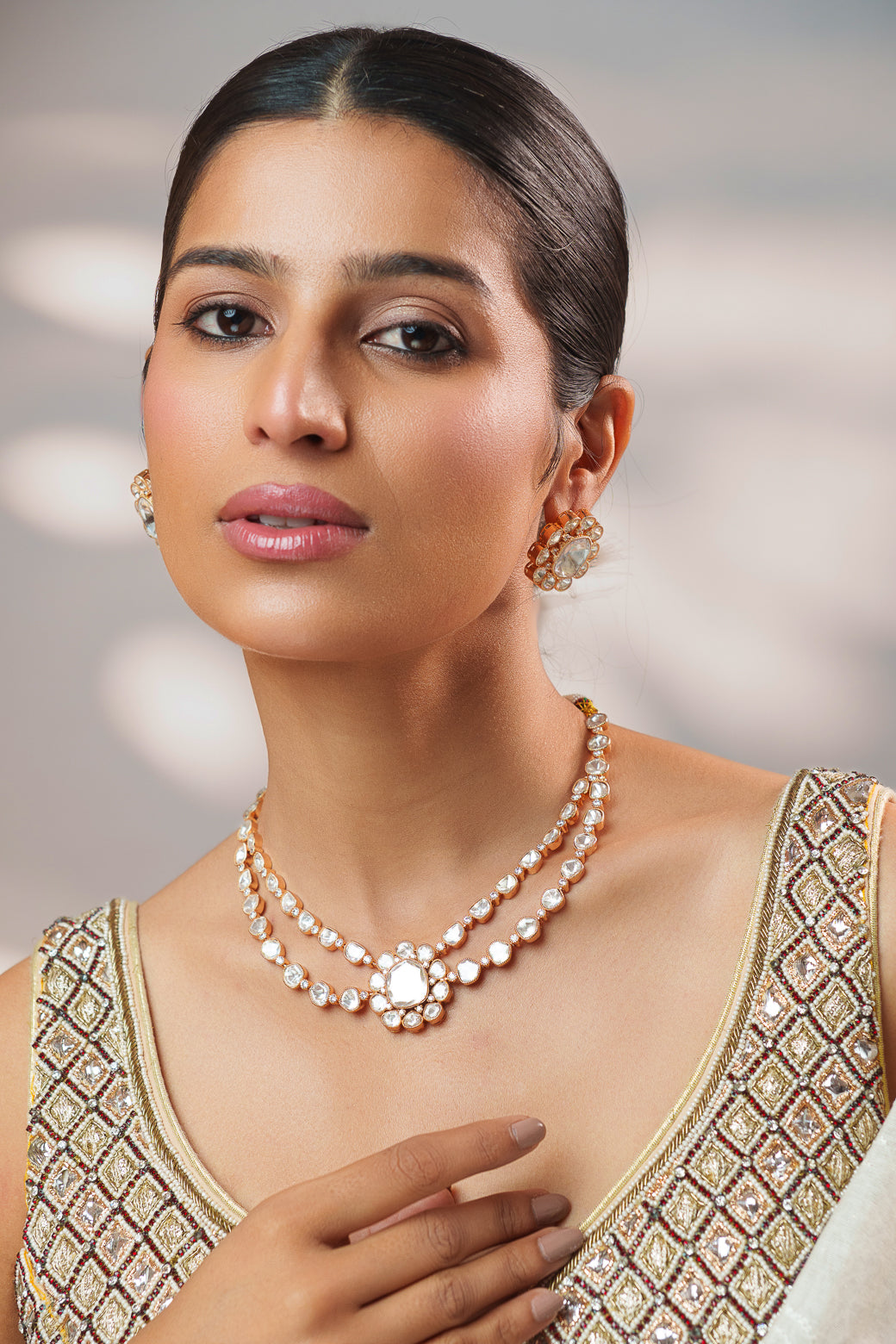 Elegant and stylish gold finish kundan polki necklace set