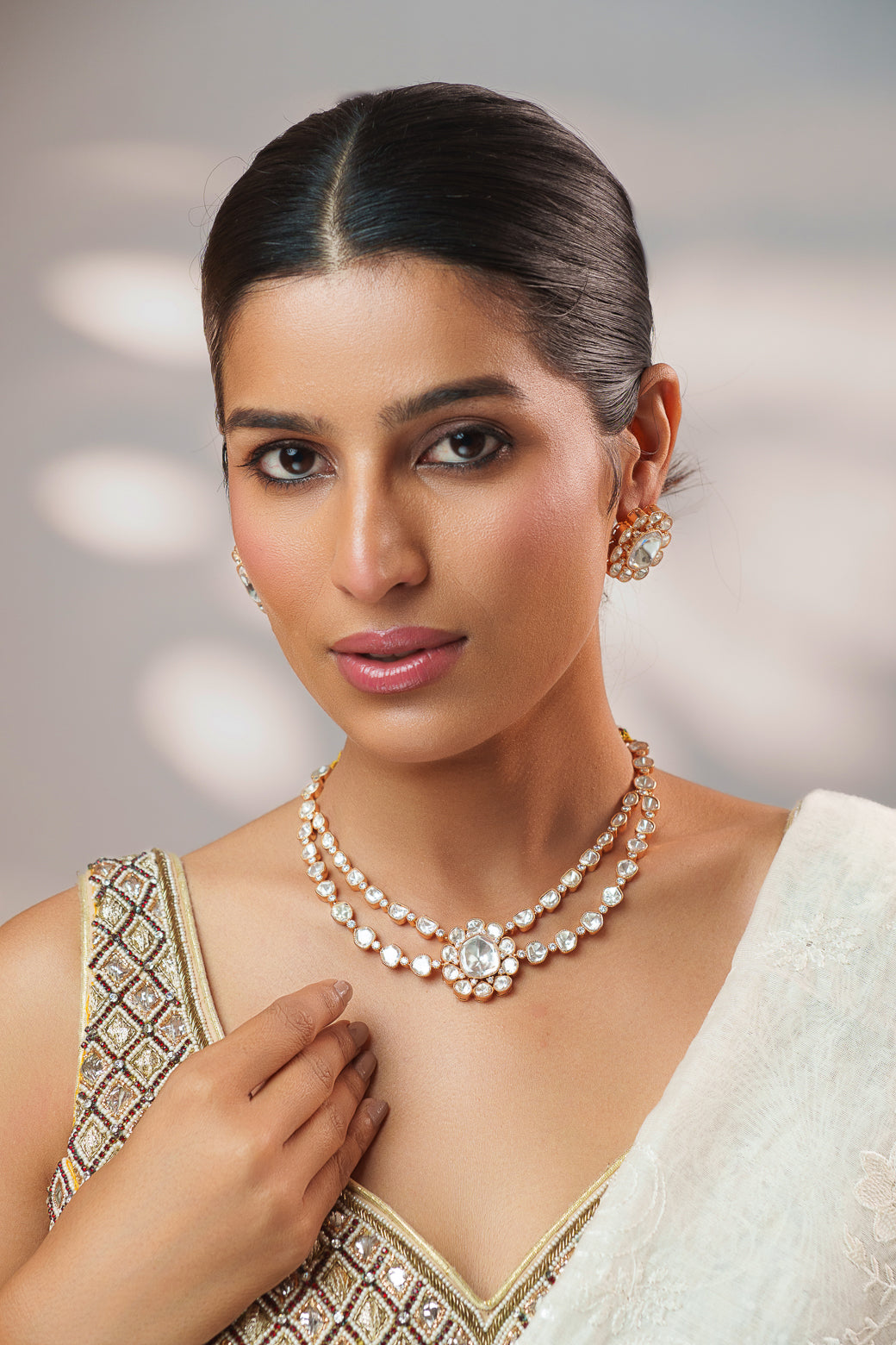 Elegant and stylish gold finish kundan polki necklace set