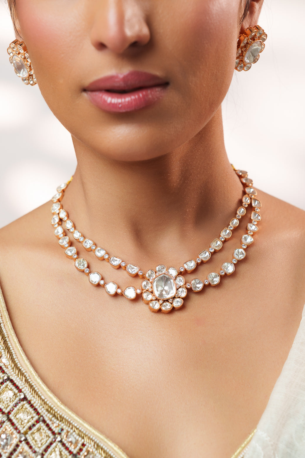 Elegant and stylish gold finish kundan polki necklace set