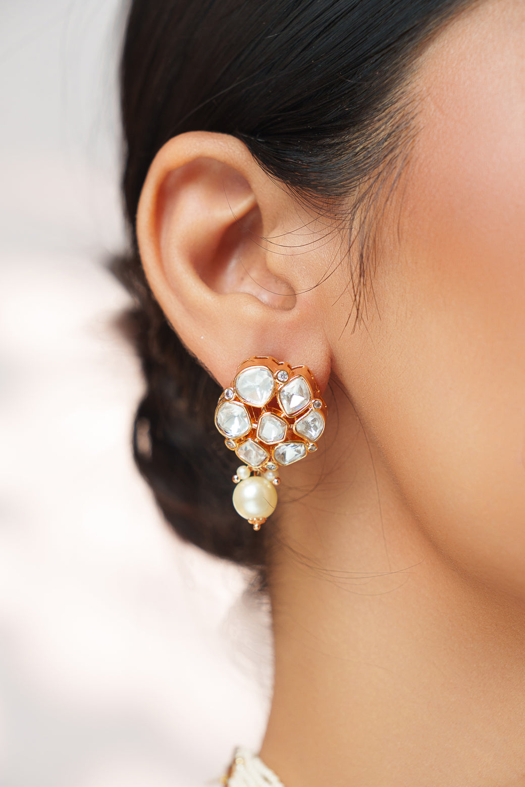 Classy kundan choker set with elegant pair of earrings.