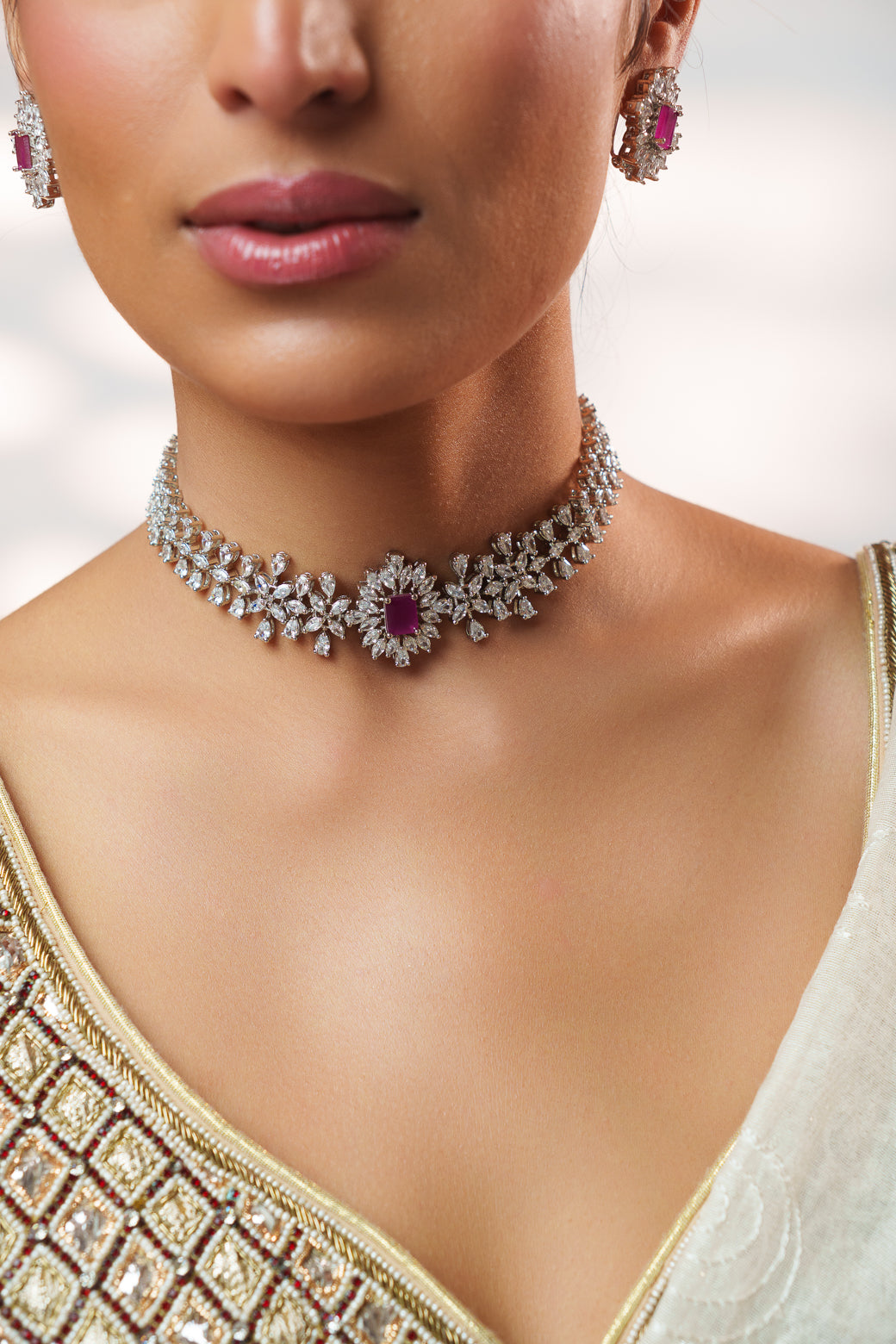 Elegant diamond choker with peach stone and earrings