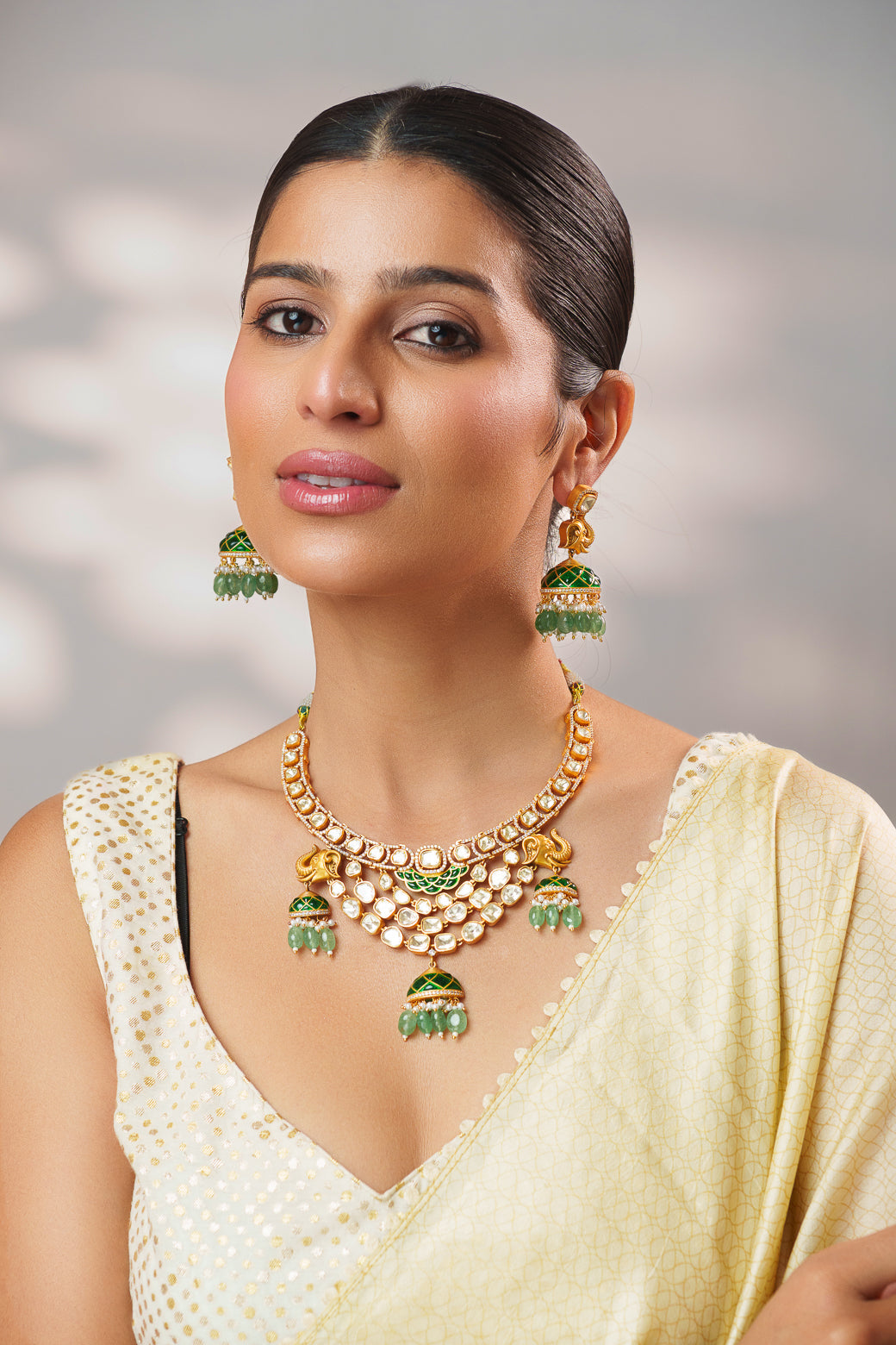Bold and dramatic moissanite necklace set with matching jhumkas