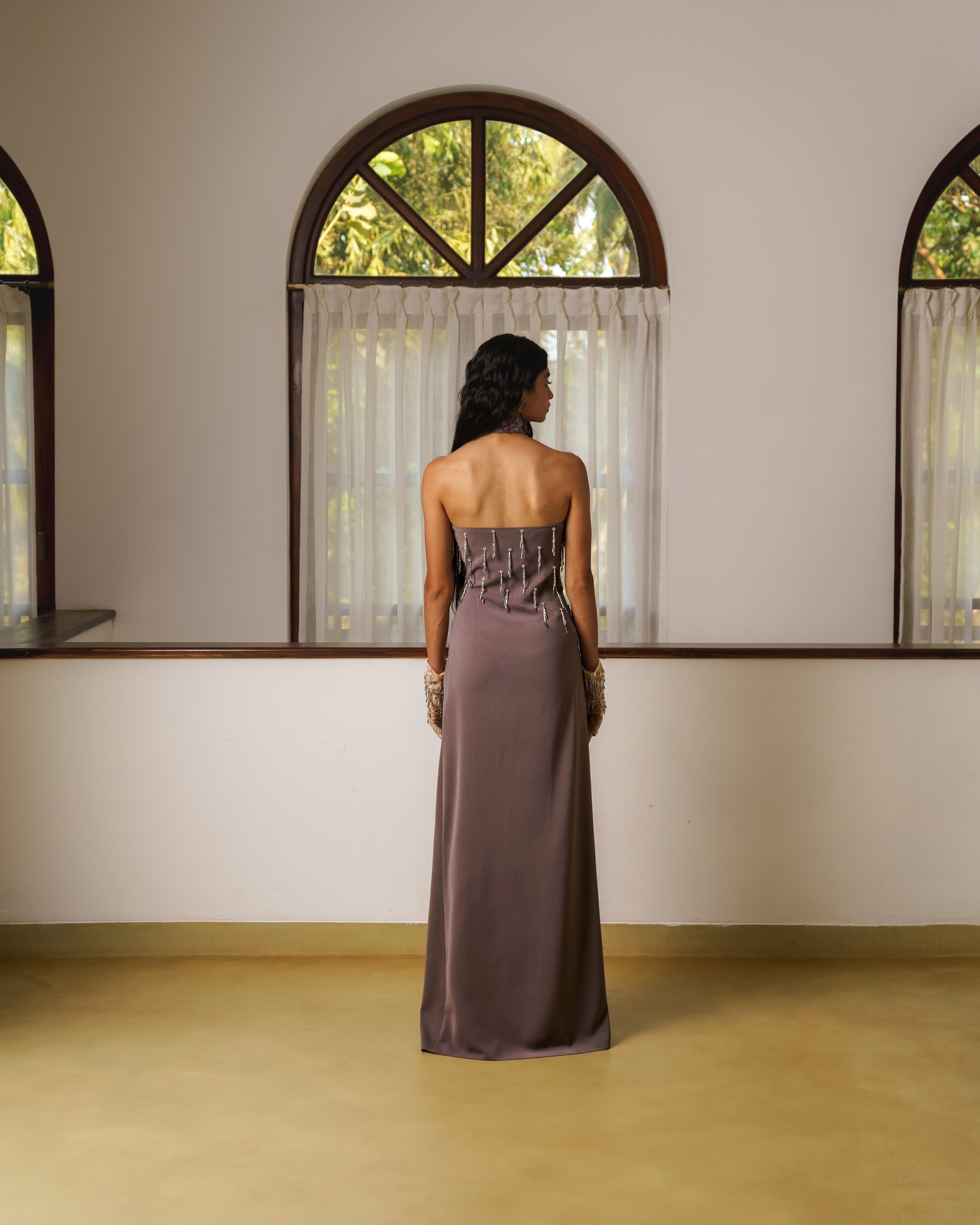 Halter neck embroidered gown with a slit