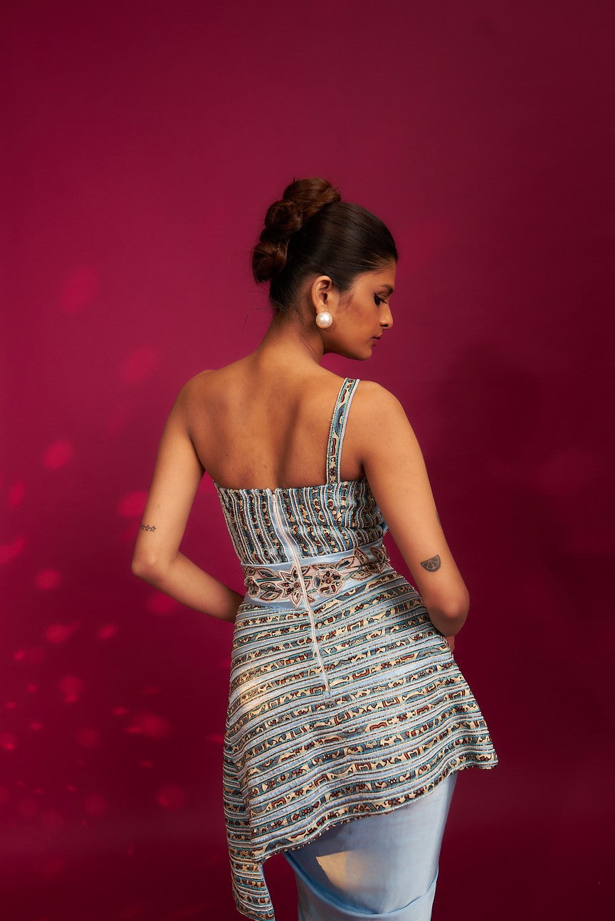 Powder blue ajrakh embroidered assymetric peplum top with Drape dhoti skirt