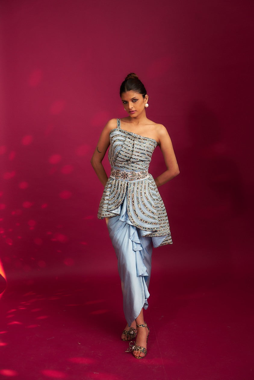 Powder blue ajrakh embroidered assymetric peplum top with Drape dhoti skirt