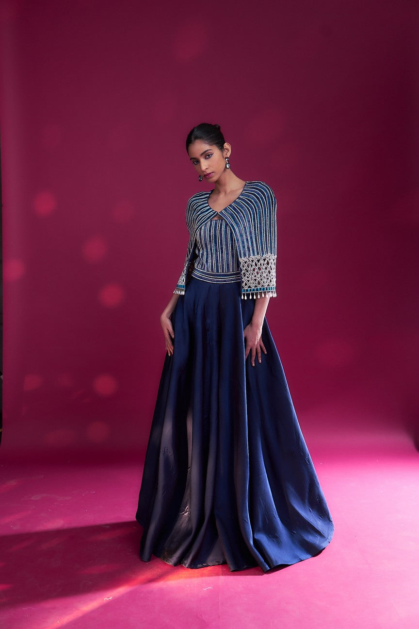 Deep blue ajrakh embellished jumpsuit with fully embsllished ajrakh stripwork cape jacket