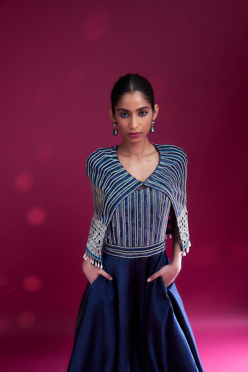 Deep blue ajrakh embellished jumpsuit with fully embsllished ajrakh stripwork cape jacket