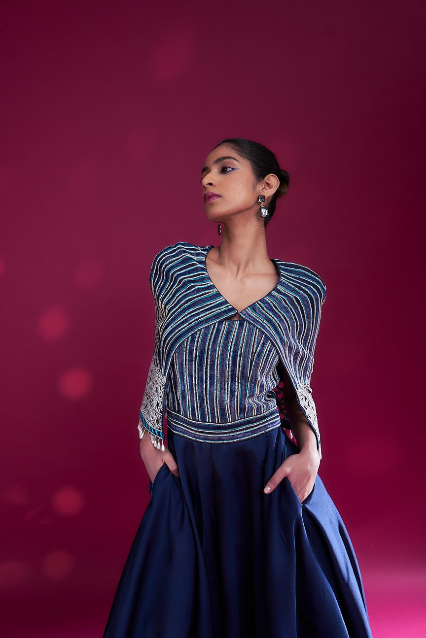Deep blue ajrakh embellished jumpsuit with fully embsllished ajrakh stripwork cape jacket