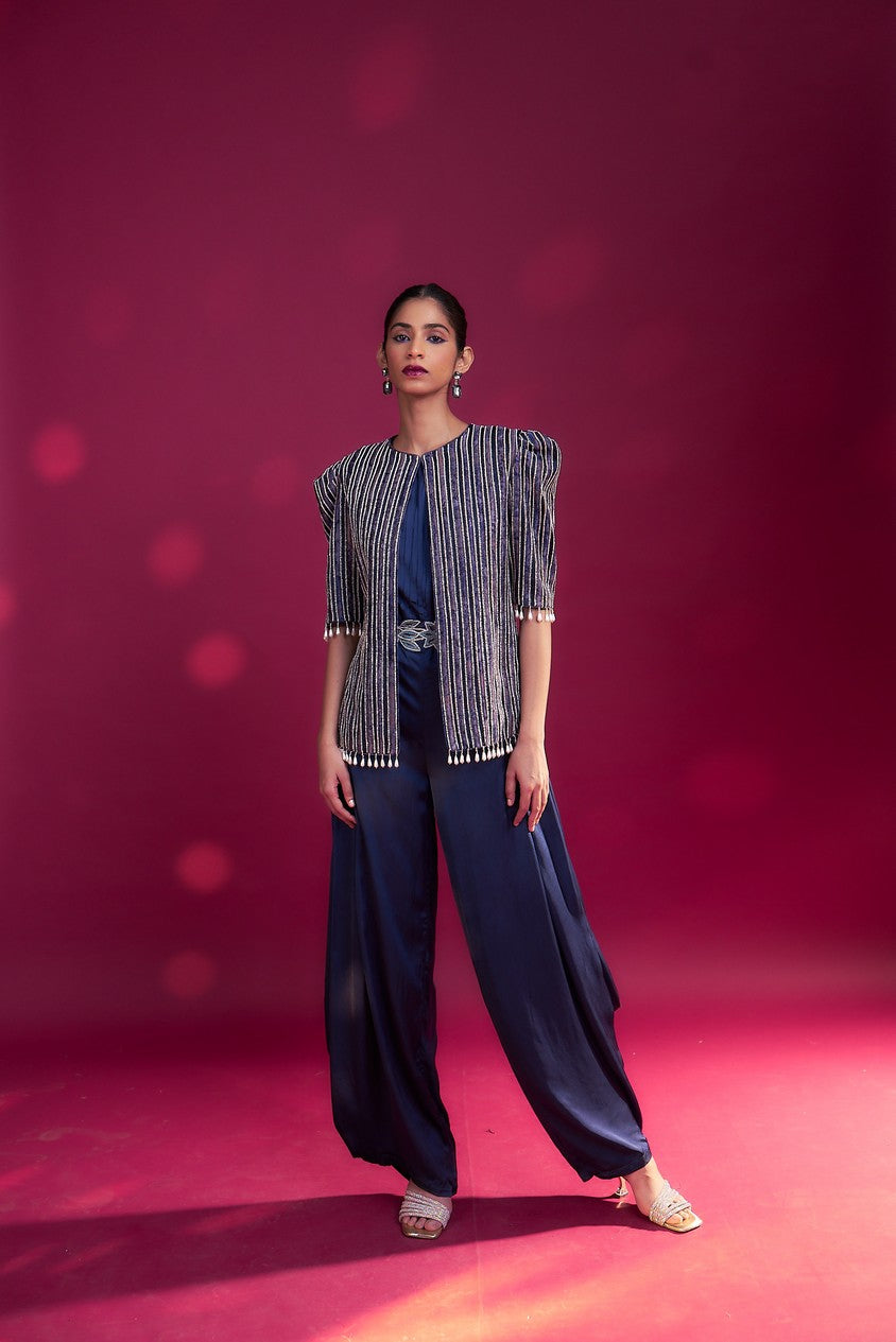 Deep blue side cowl jumpsuit with Ajrakh embellished jacket with patchwork waistbelt