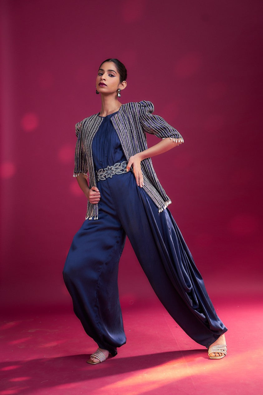Deep blue side cowl jumpsuit with Ajrakh embellished jacket with patchwork waistbelt