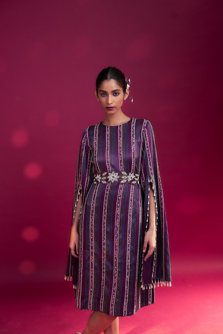 Dark purple heavily stripworked dress with cape sleeves