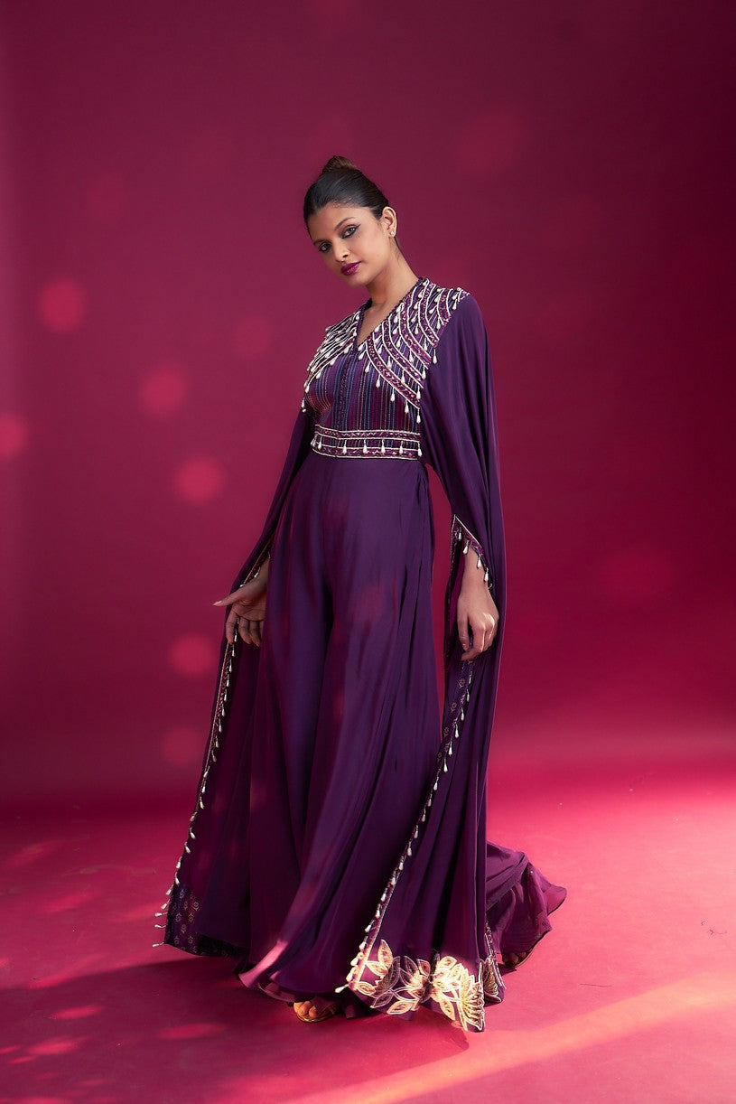 Purple heavily embellished jumpsuit with embroidered cape sleeves