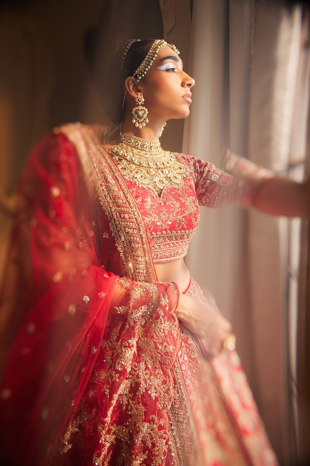Red heavily embroidered lehenga