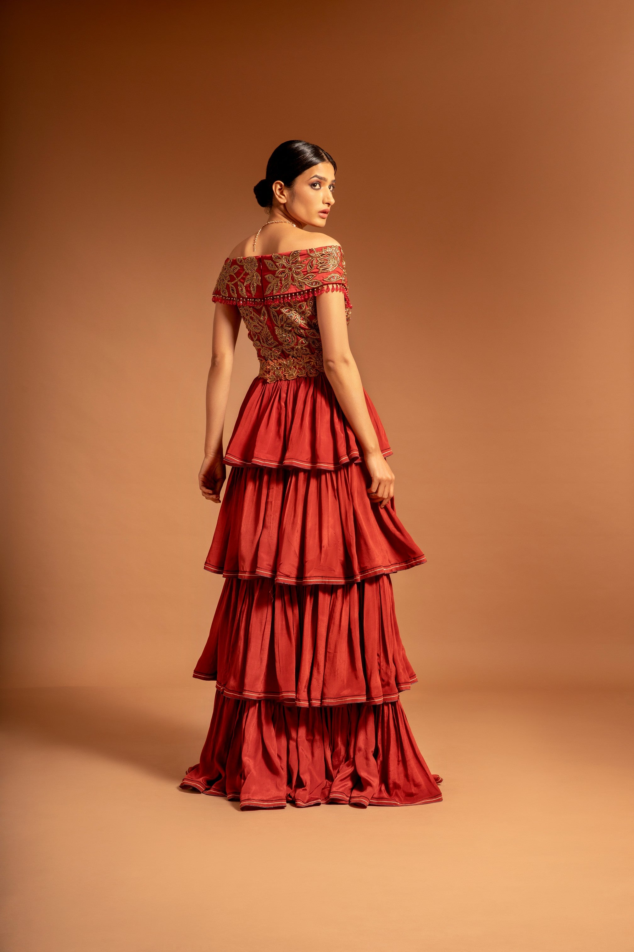 Maroon fully ajrakh patchworked layered gown