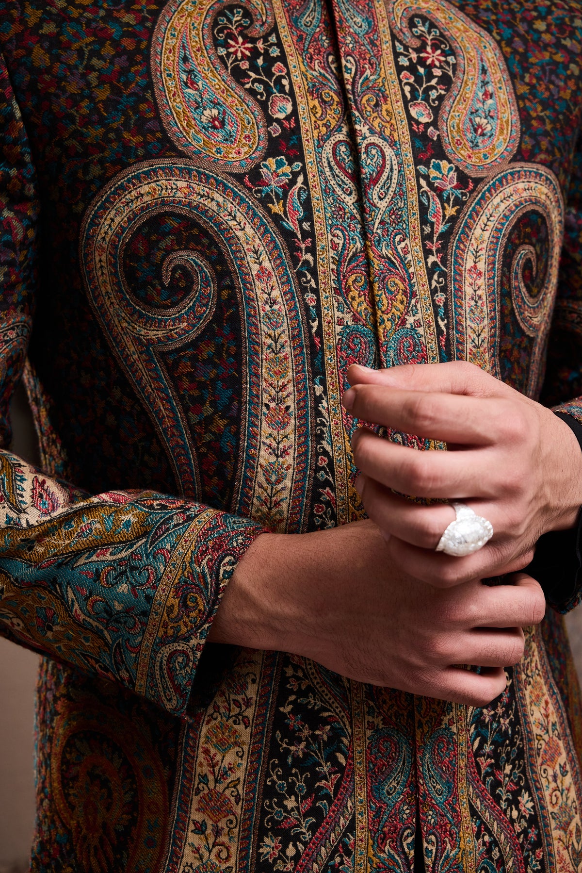 JAMAWAR PATTERNED SHORT ACHKAN PAIRED WITH A BLACK COTTON SILK KURTA AND PANT
