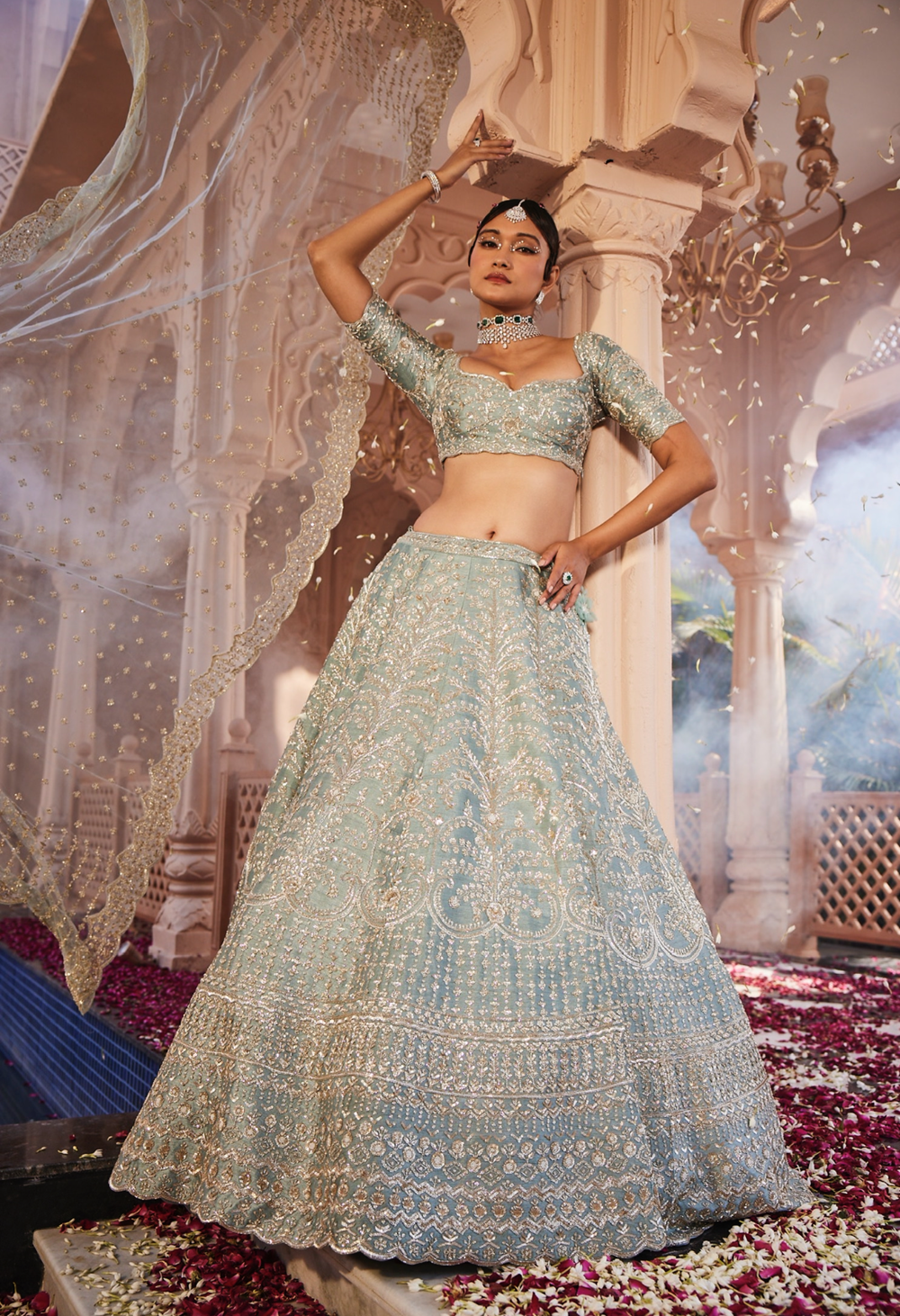 Dusty firoza heavily hand embroidered lehenga