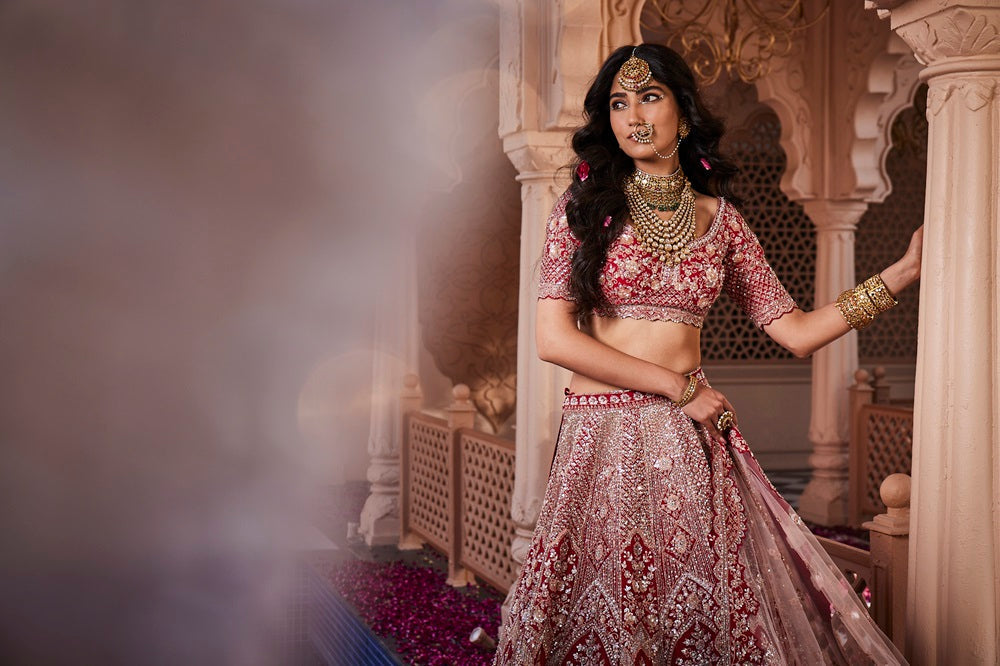 Red heavily embroidered lehenga