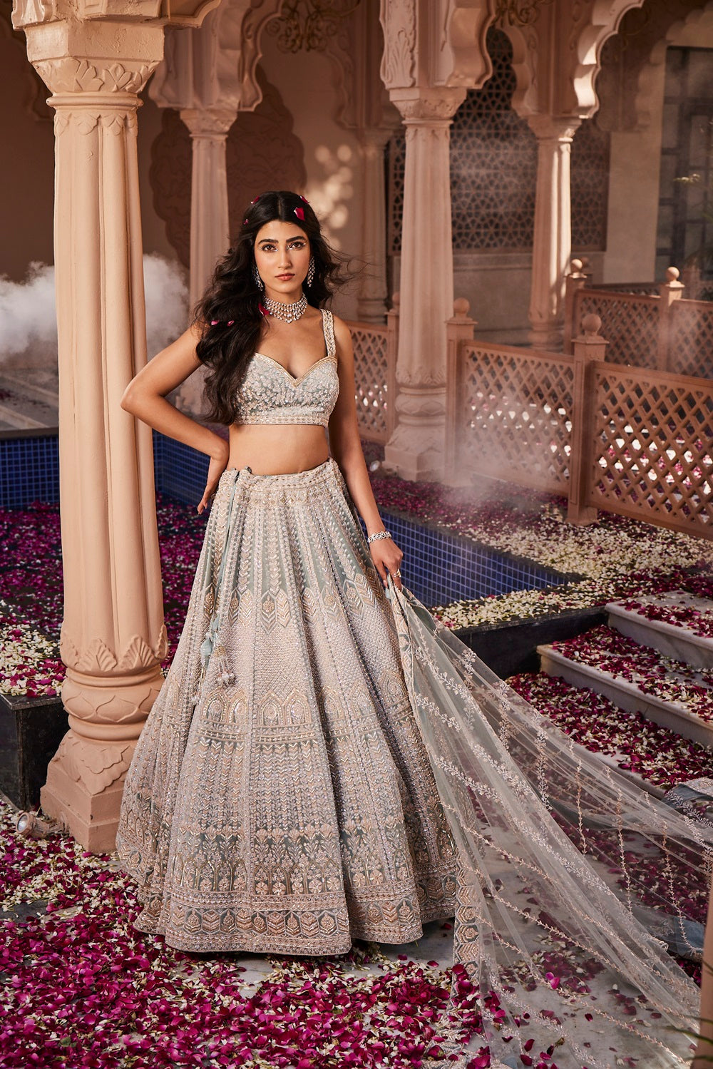 Dusty firoza velvet hand embroidered lehenga