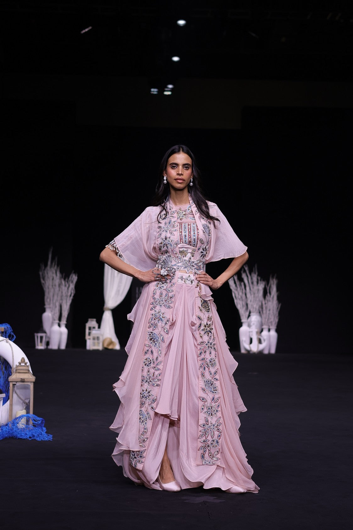 Peachy pink Ajrakh embroidered blouse paired up with Dhoti and ruffled dupatta