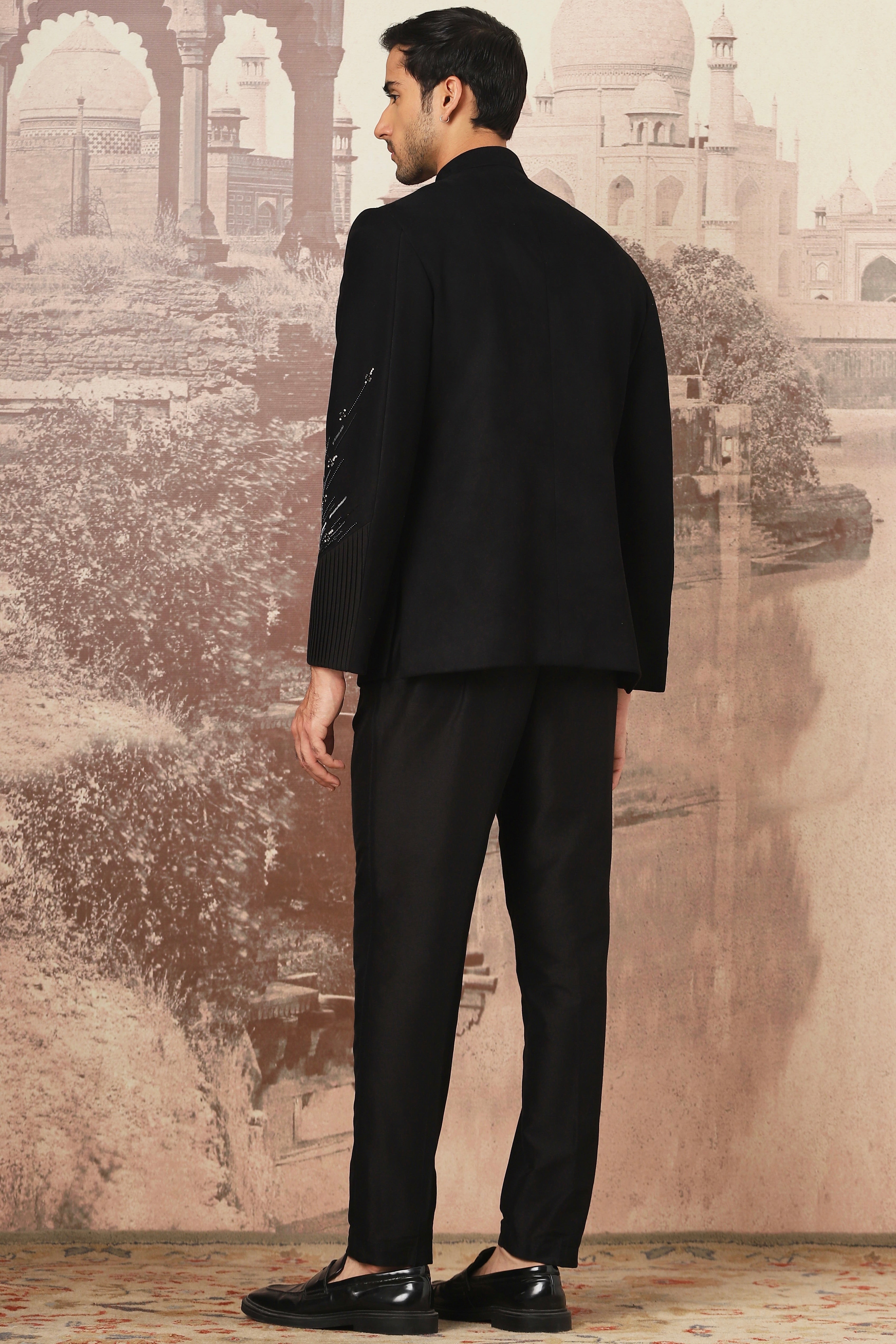 The Midnight Black Asymmetrical Hand Embroidered Bandhgala Set .