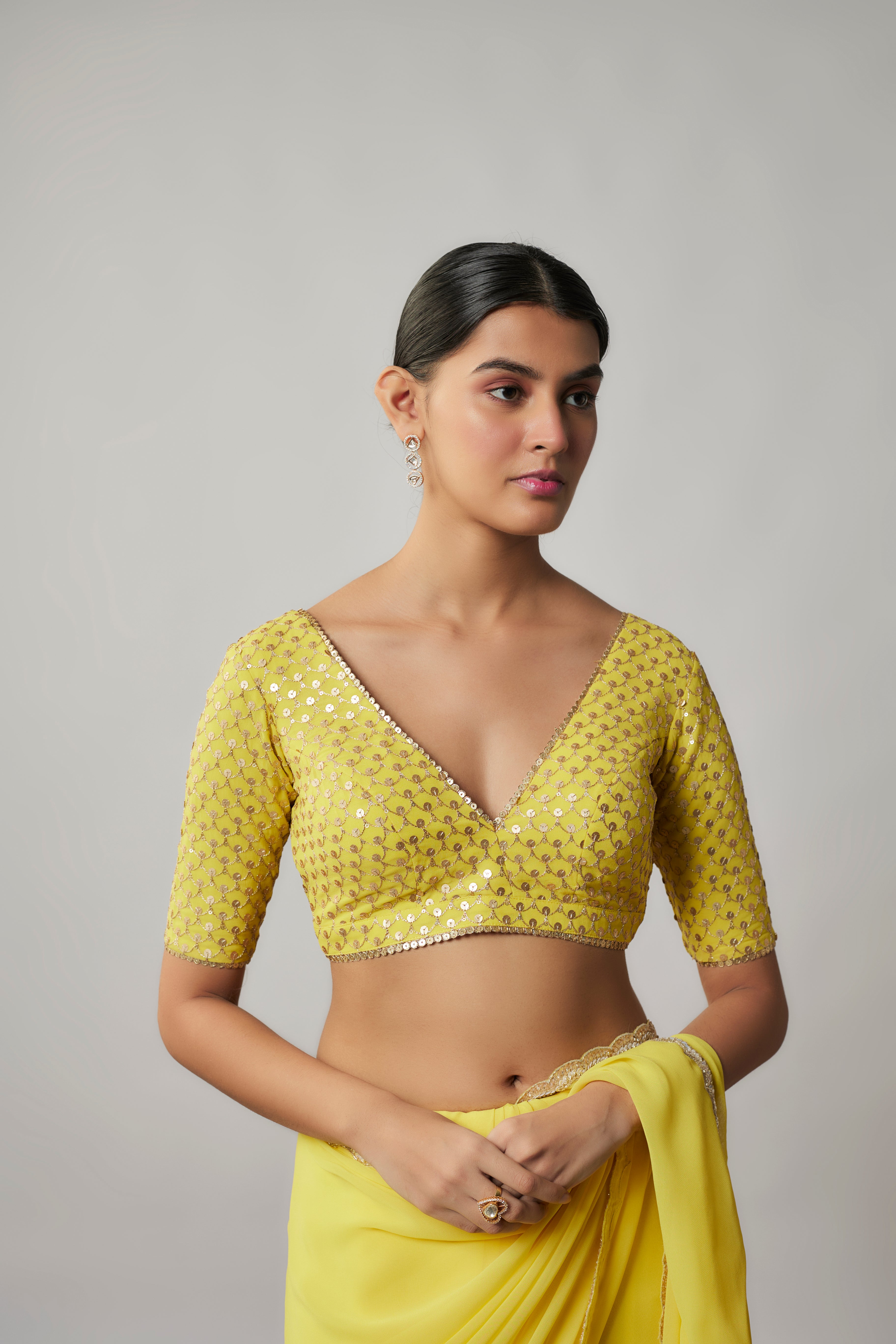 Lemon yellow sequin and zari embroidered georgette saree set