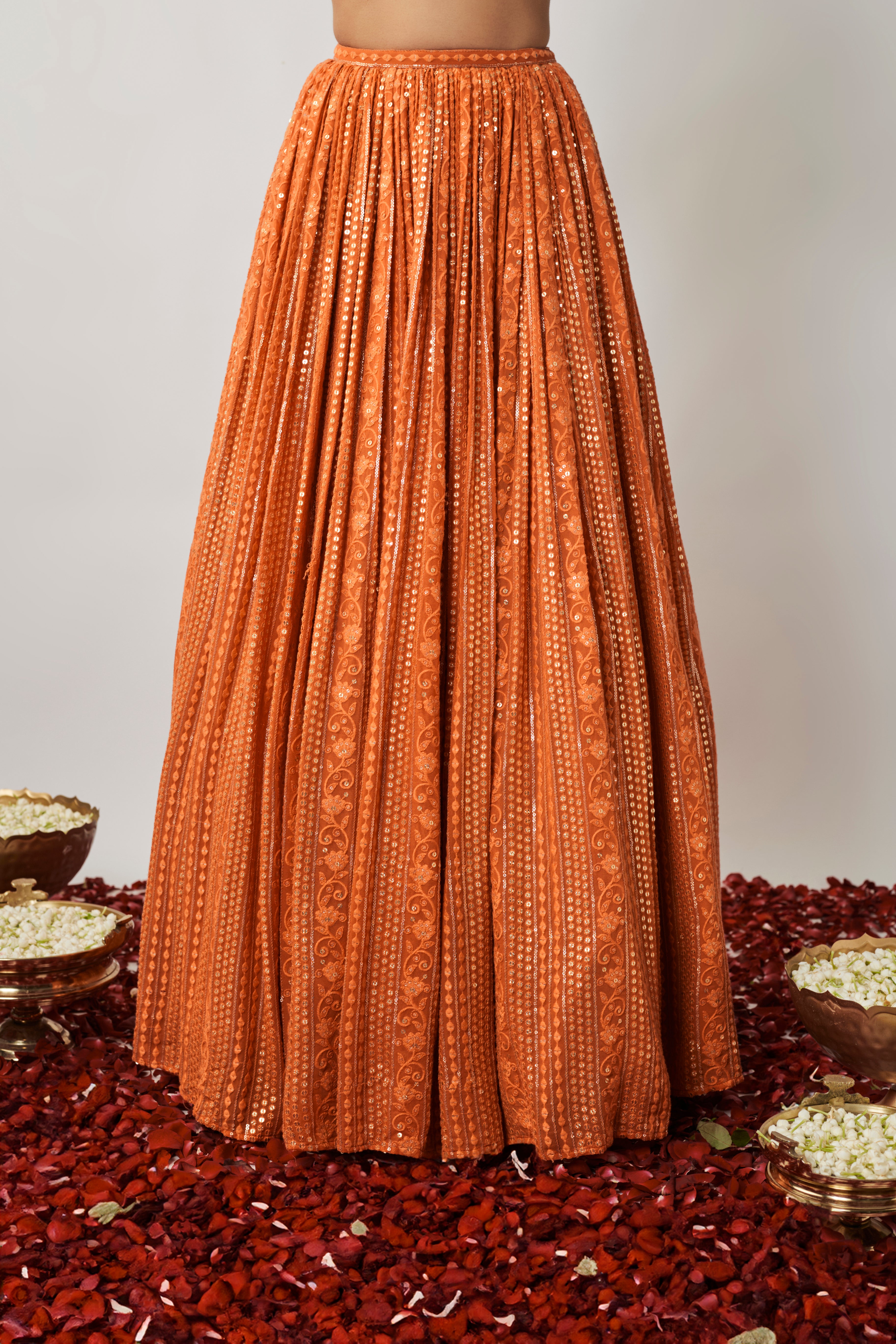 Saffron orange sequin and thread embroidered georgette lehenga set