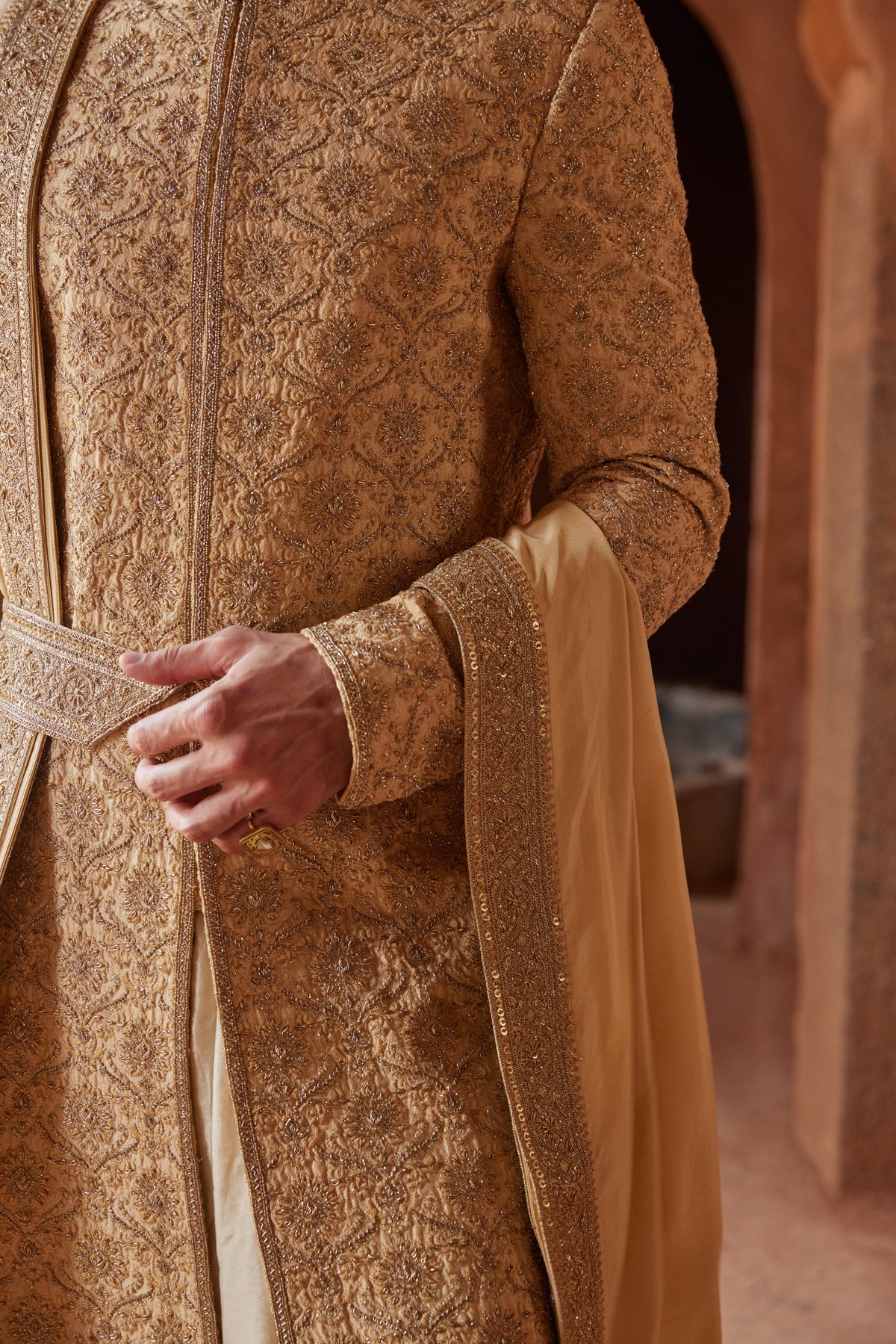 GOLD RAW SILK EMBROIDERED SHERWANI WITH A KALIDAR CHOGA AND CHURIDAR PYJAMA IN BEIGE MONGA TUSSAR