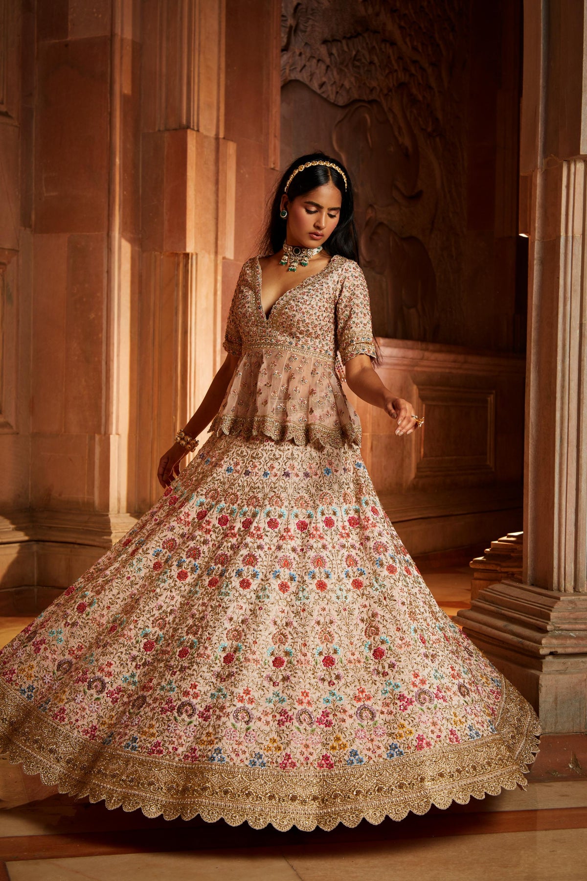 Blush Pink Raw Silk Lehenga with a Peplum Top and Tulle Dupatta