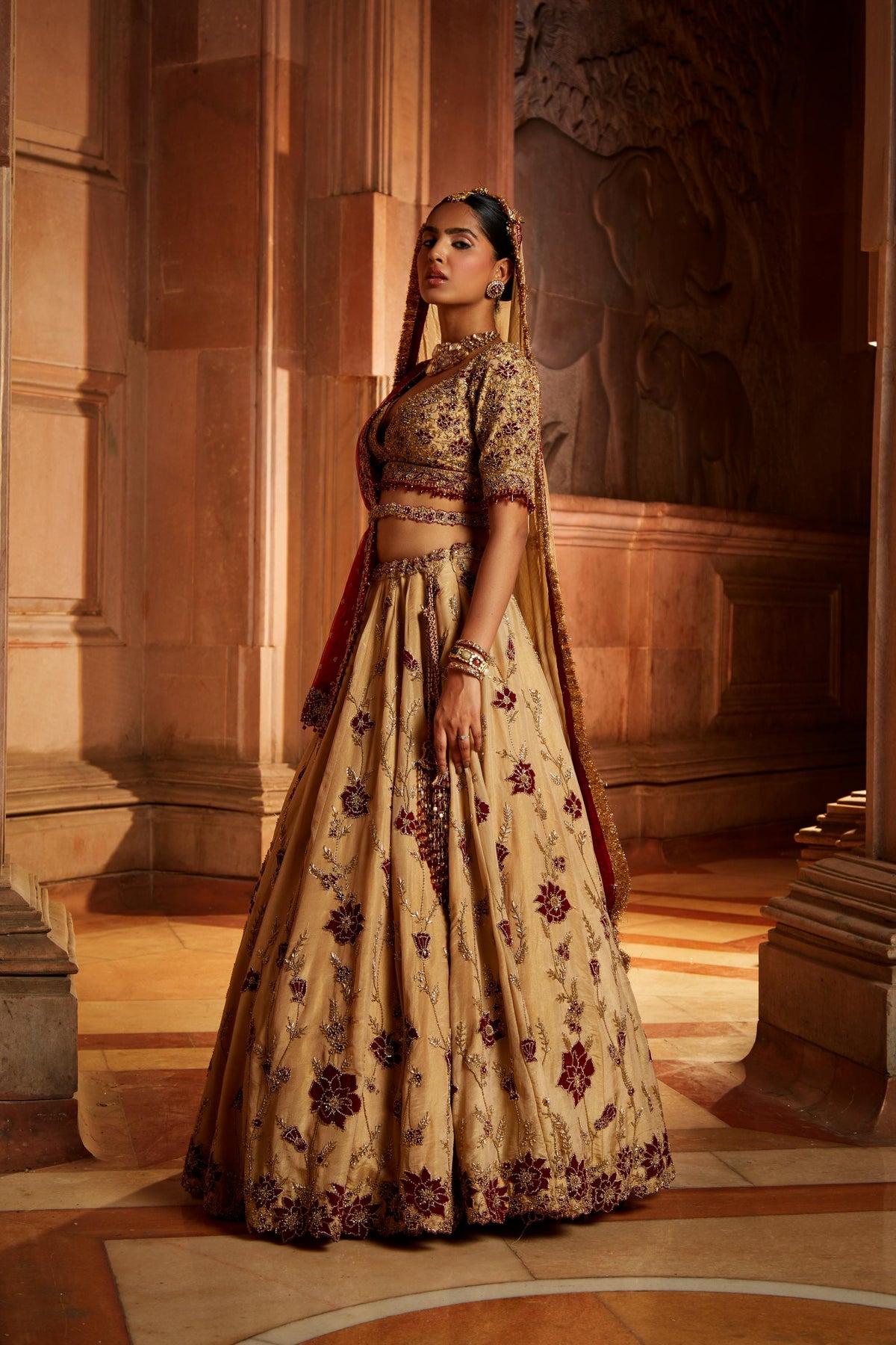 Gold Tissue Lehenga Choli and Belt with contrasting Red Tulle Dupatta and Optional Gold Tissue Second Dupatta
