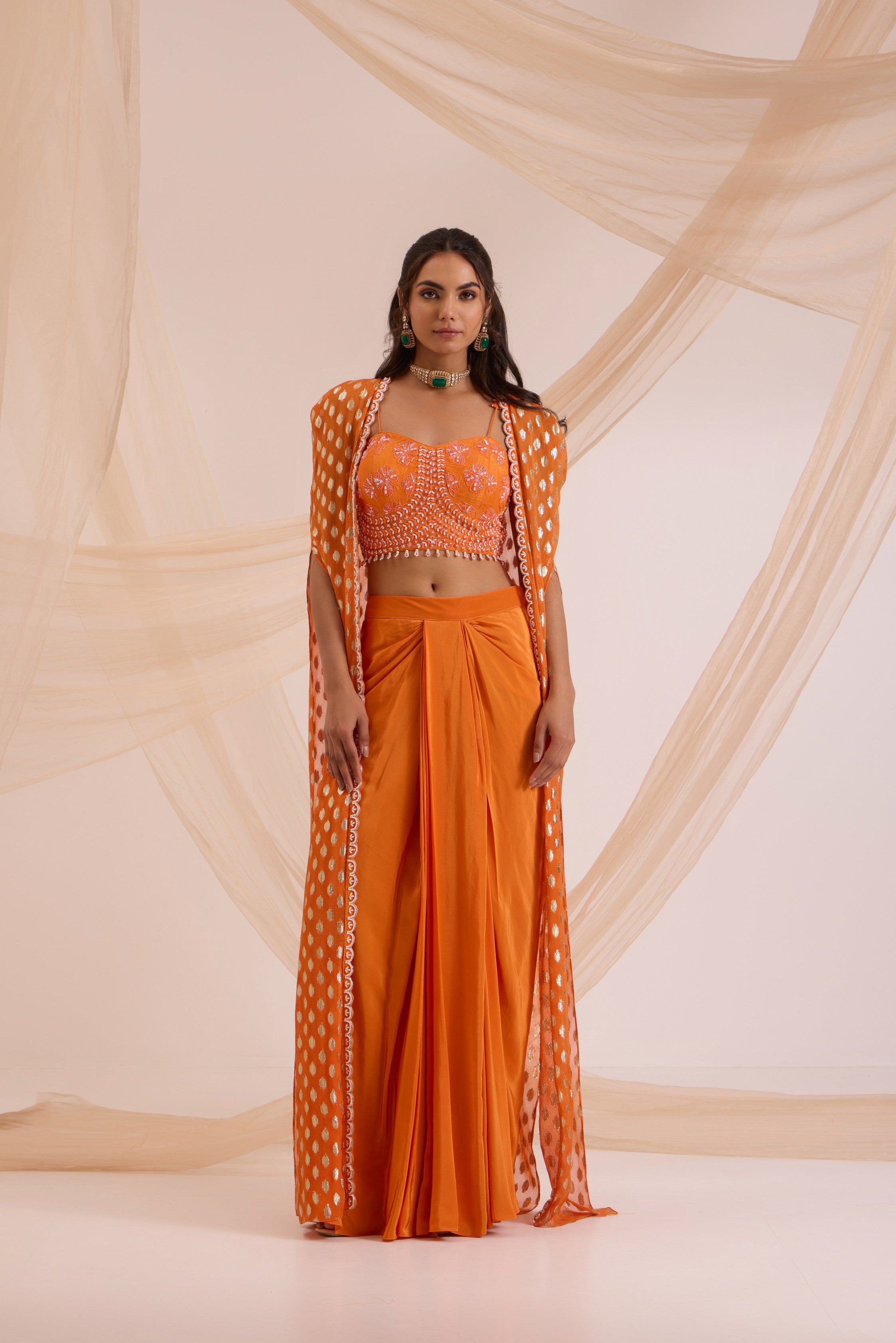 Orange bustier with drape skirt & cape