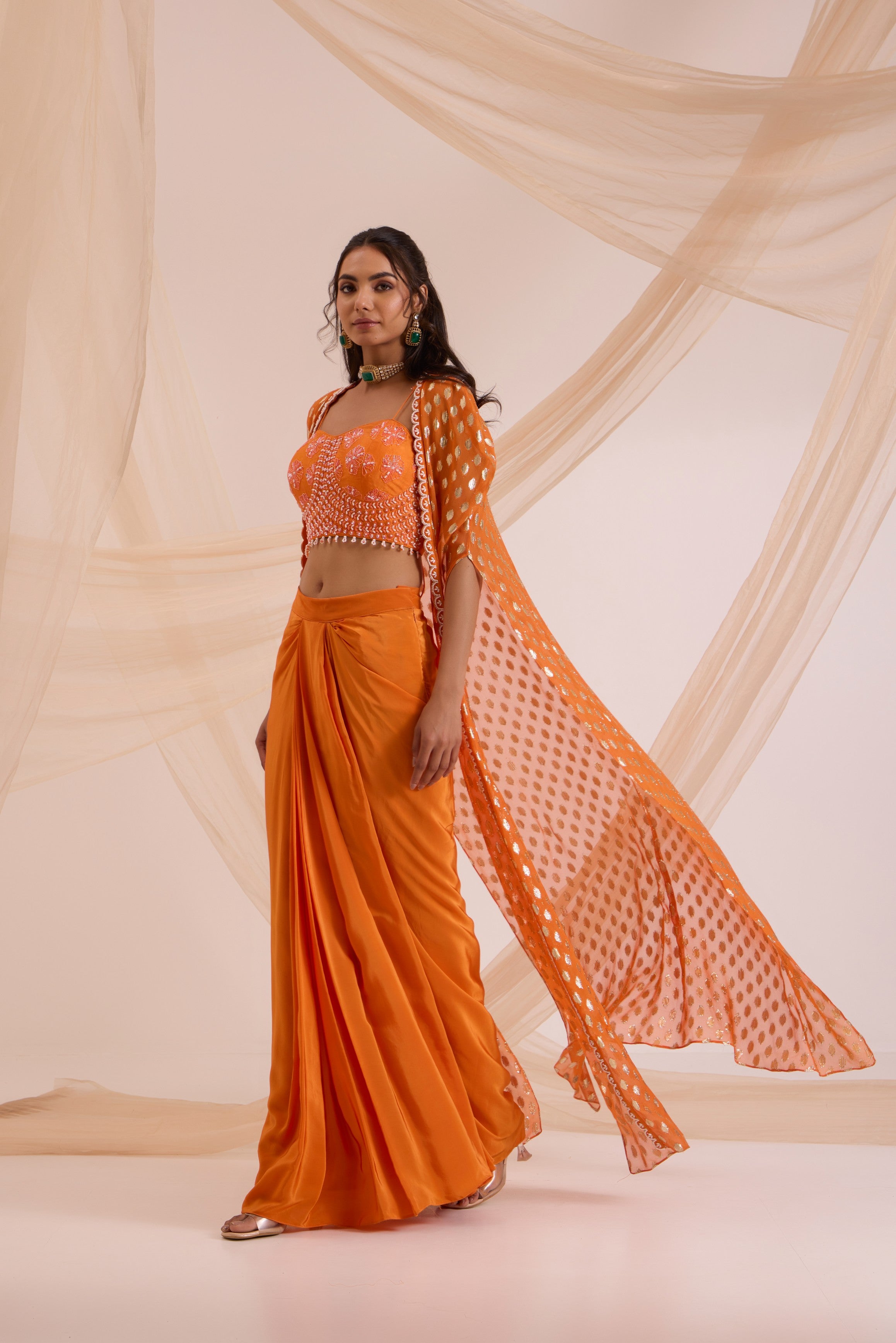 Orange bustier with drape skirt & cape