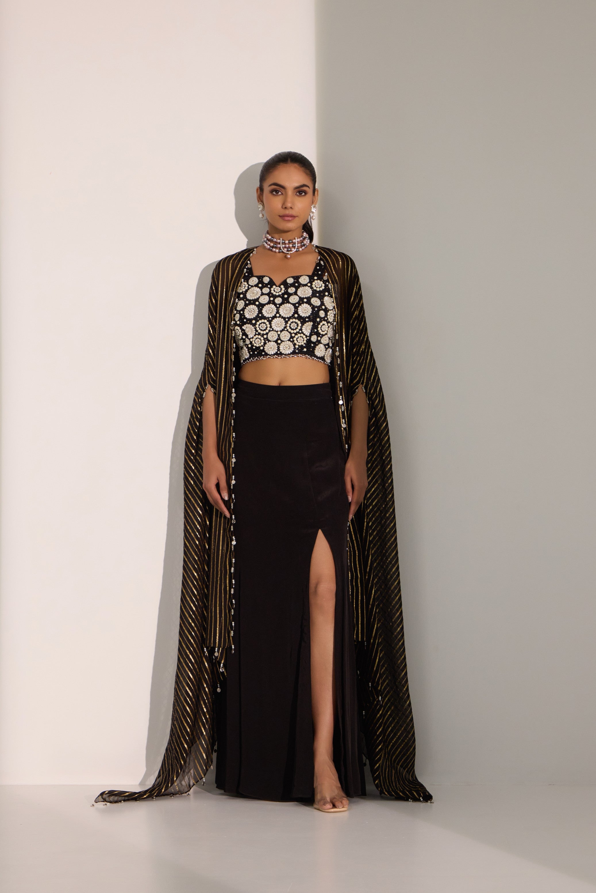 Black bustier with side slit skirt & cape set