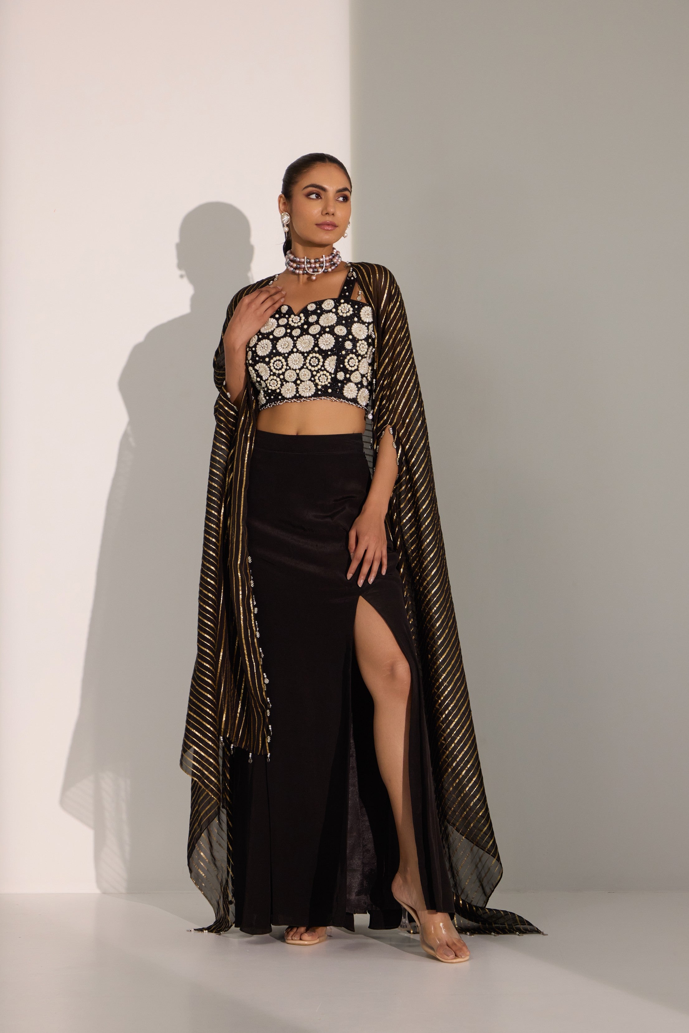 Black bustier with side slit skirt & cape set