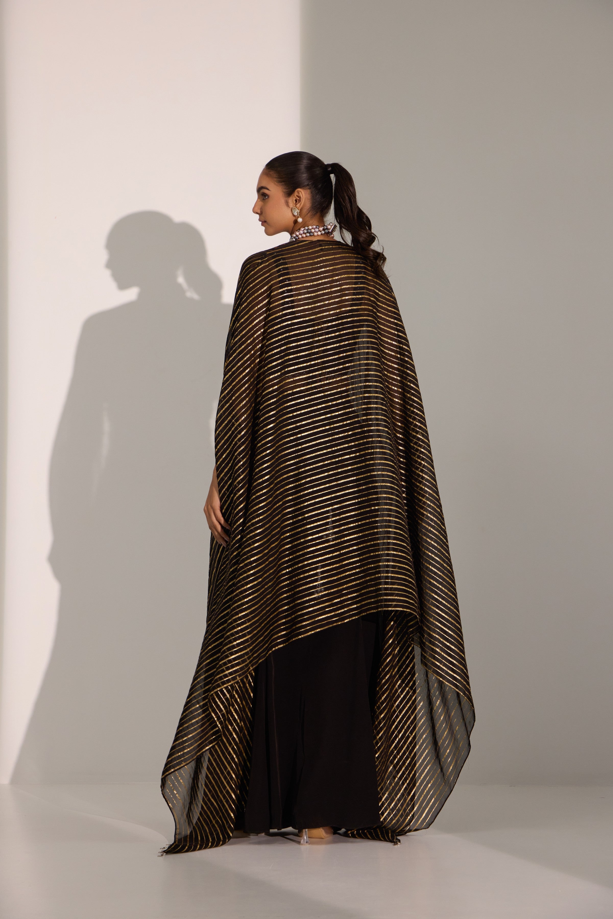 Black bustier with side slit skirt & cape set