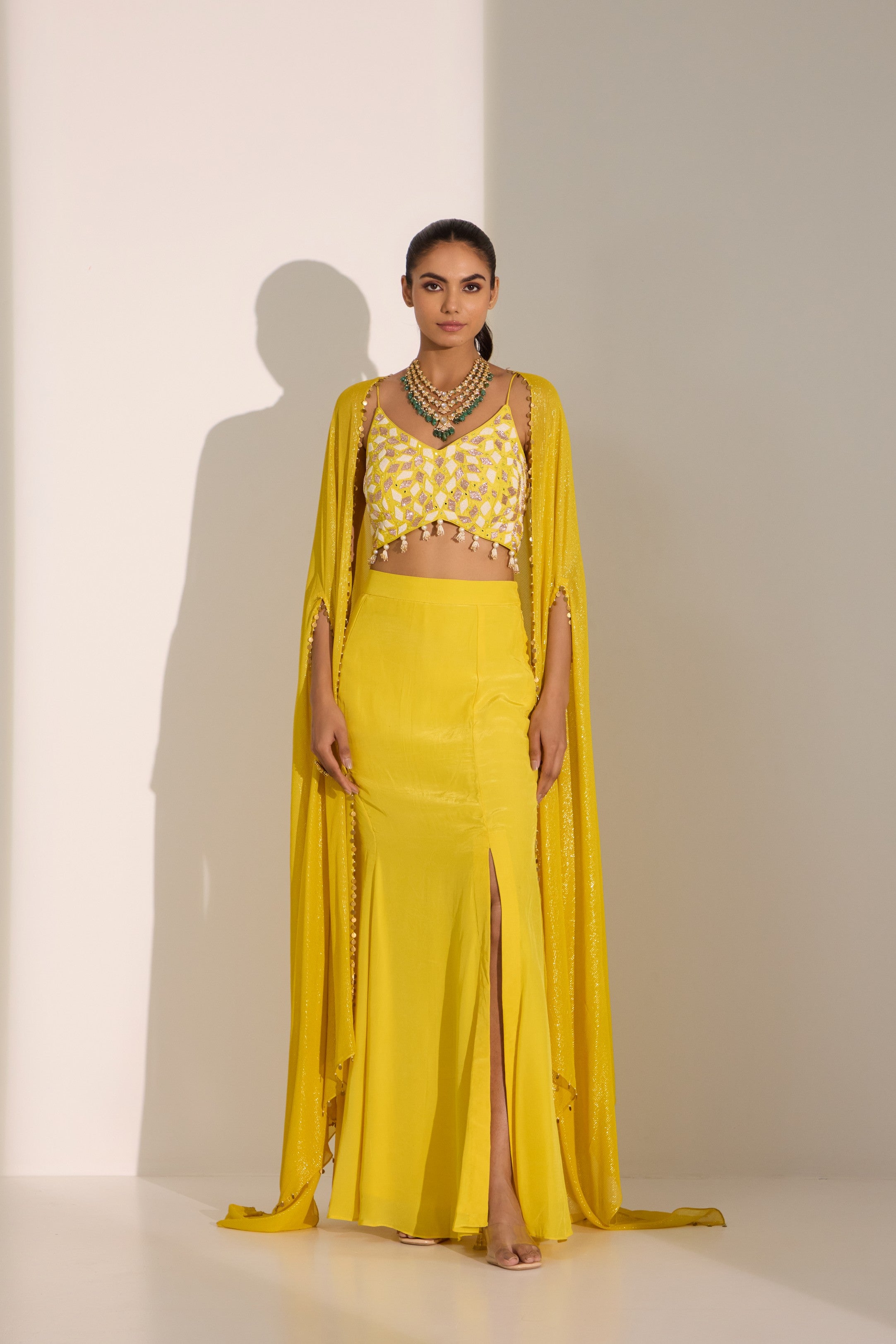 Yellow bustier with side slit skirt & cape set