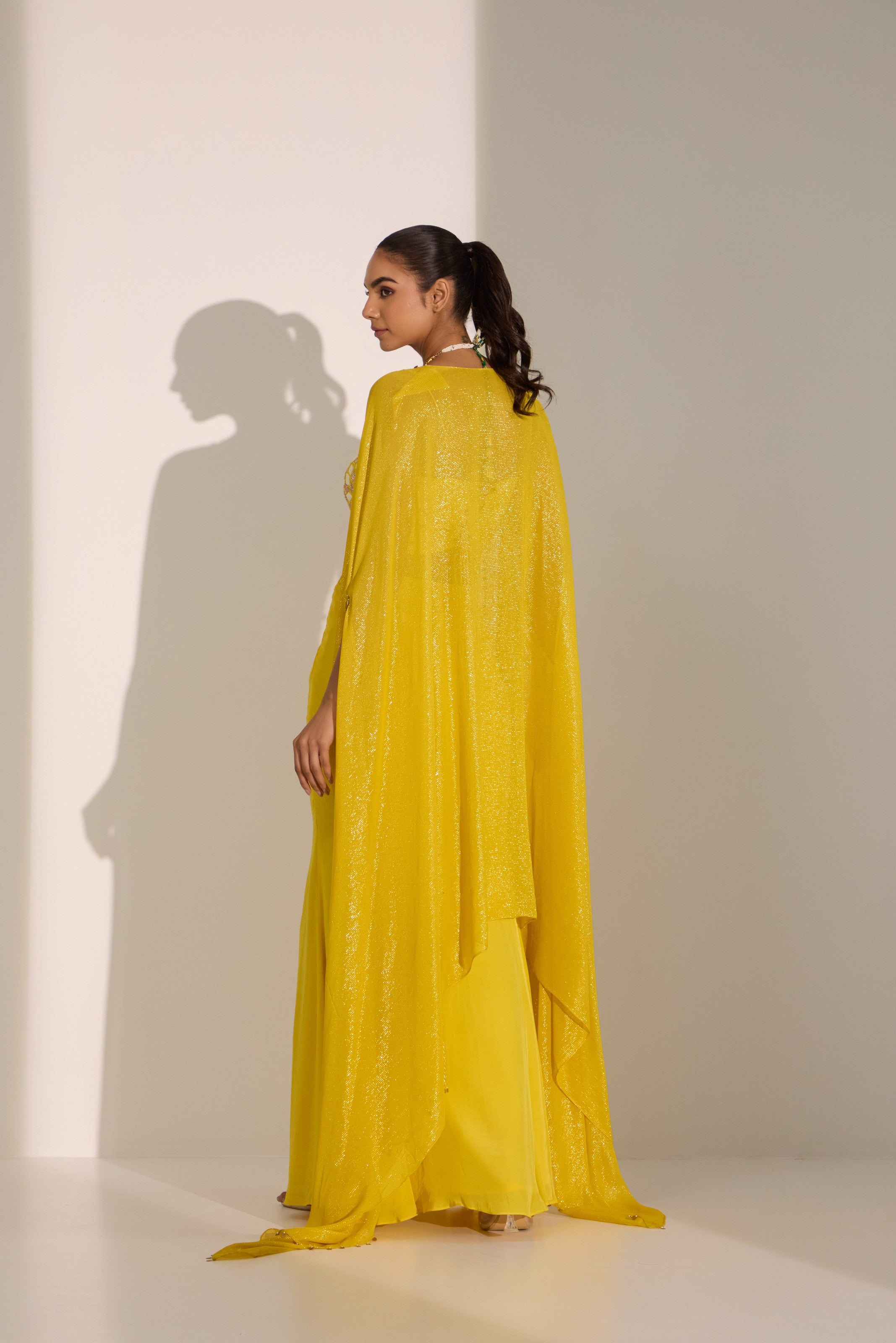 Yellow bustier with side slit skirt & cape set